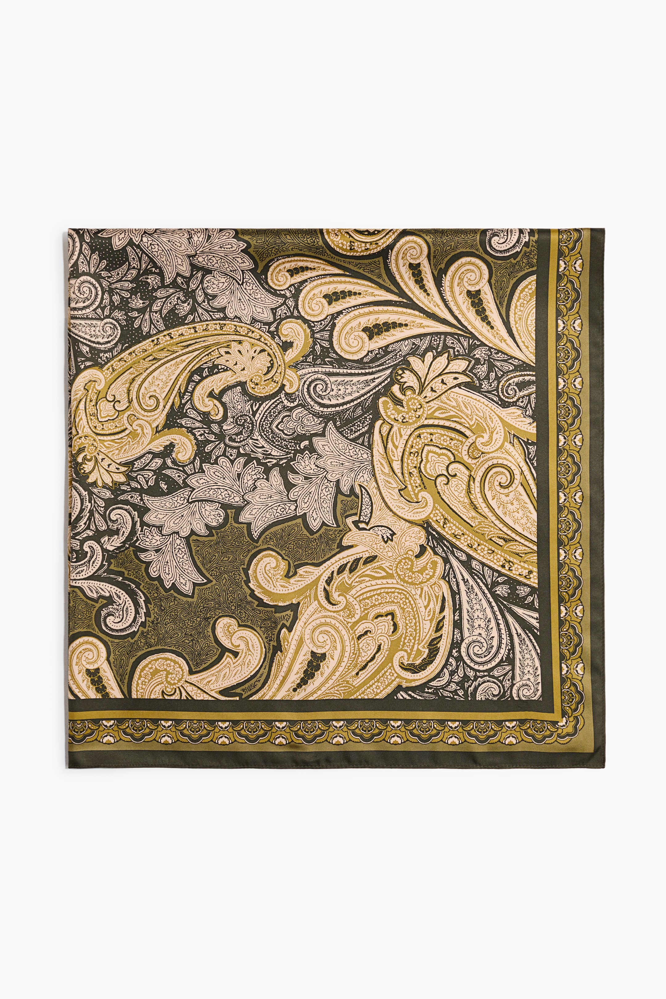 View larger image: A square scarf in a soft weave is lying flat, displaying an intricate paisley and floral pattern in shades of olive green, mustard yellow, beige, and black. A decorative, multi-layered border is framing the edges of the scarf.