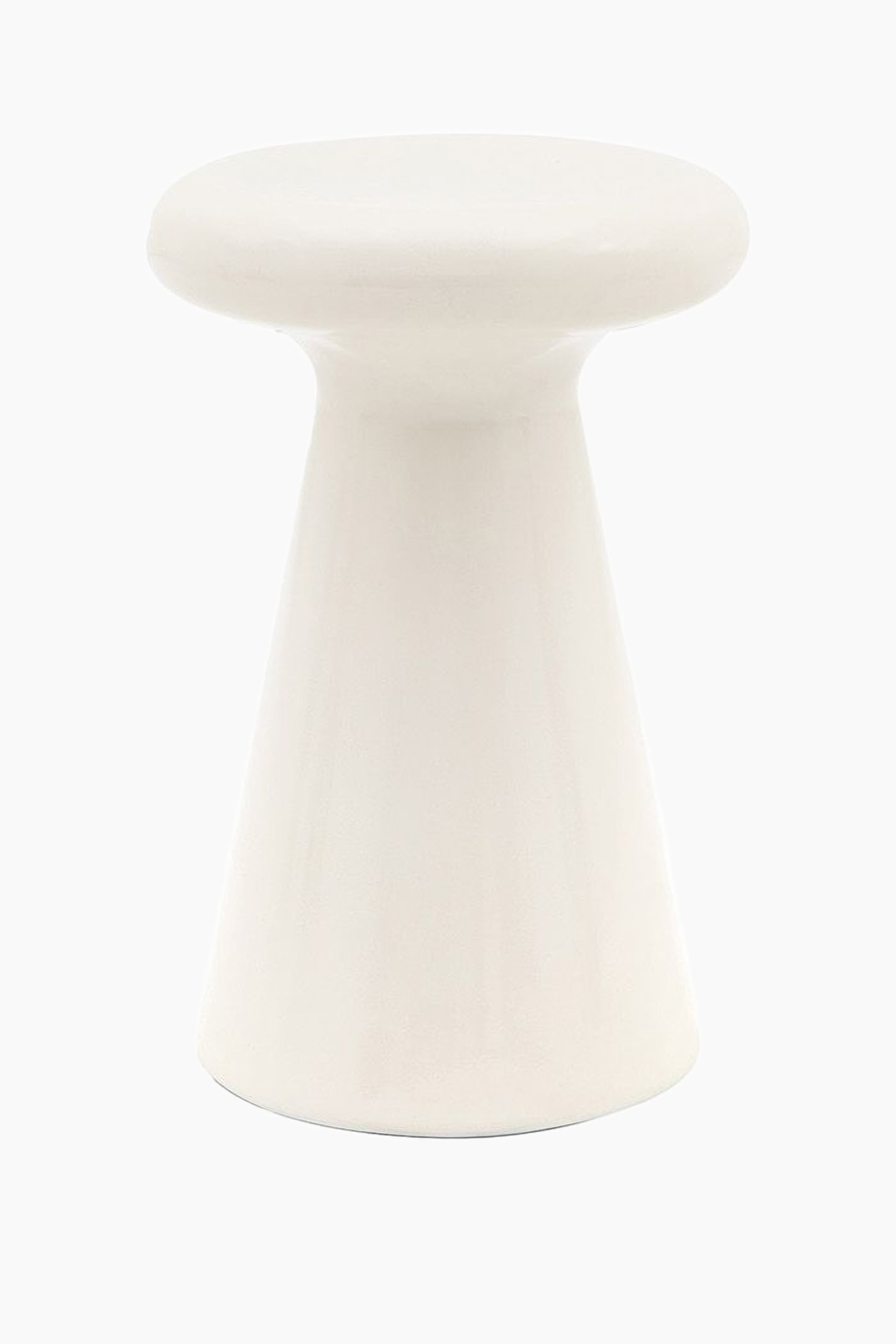 View larger image: A white stool with a round, flat top rests on a narrow, concave stem that expands into a wider, conical base. The stool is angled slightly to the right, highlighting its smooth surface.