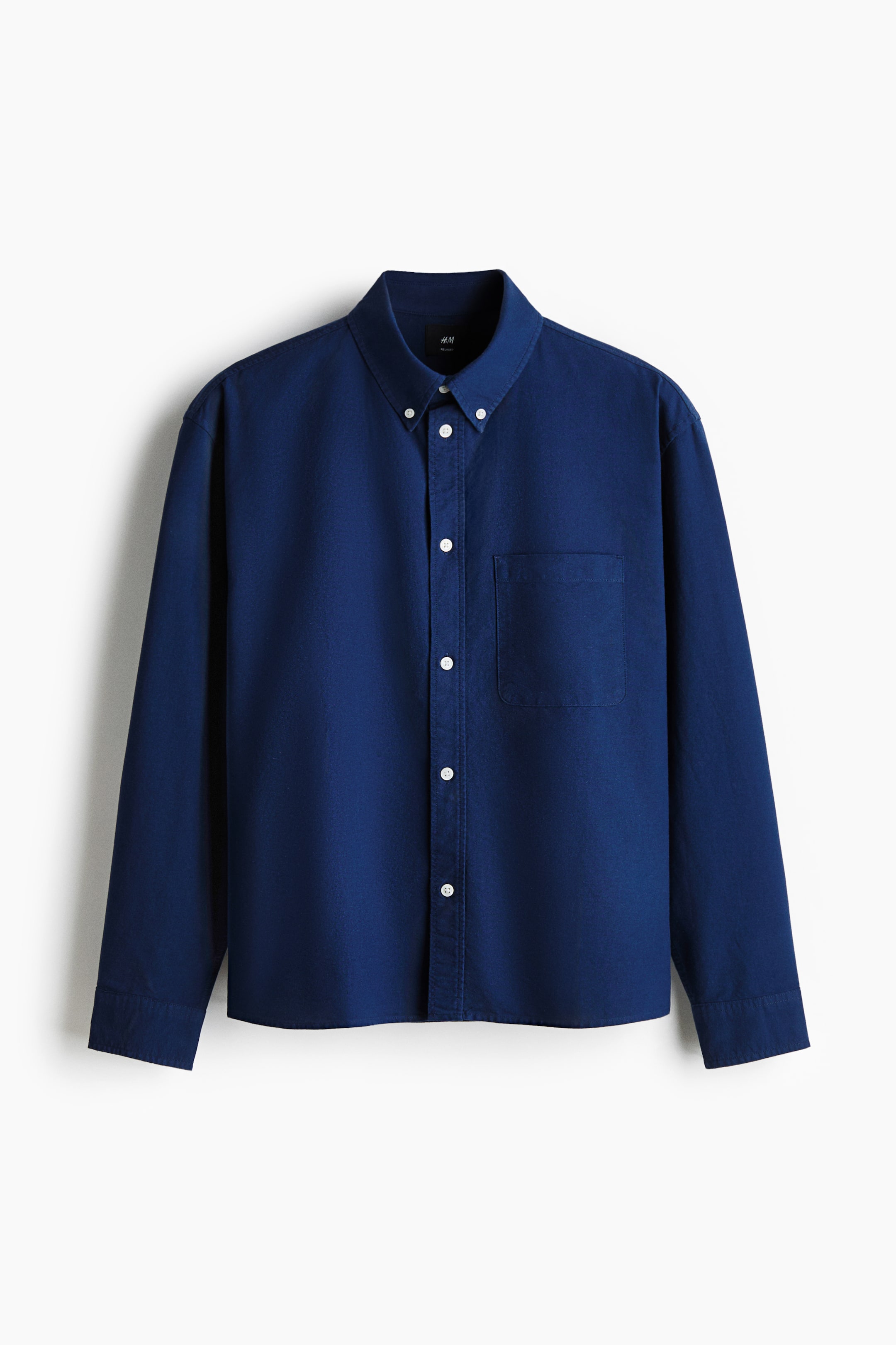 View larger image: A dark blue long-sleeved shirt is presenting FRONT, featuring a button-down collar, a full button placket with white buttons, a single chest pocket on the left side, and buttoned cuffs on its long sleeves.