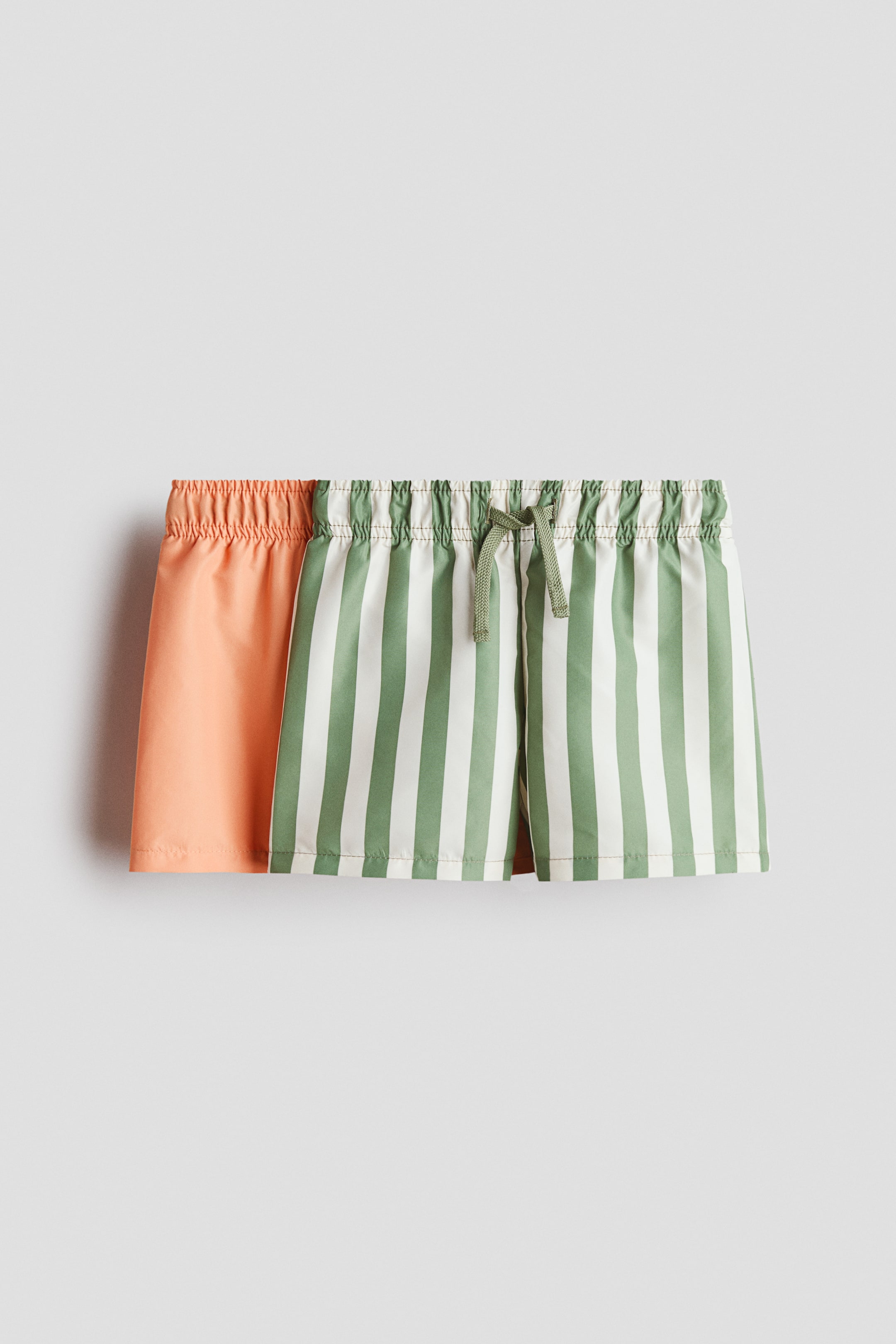 View larger image: 2-pack swim shorts - Orange/Green striped - Kids | H&M HK 1