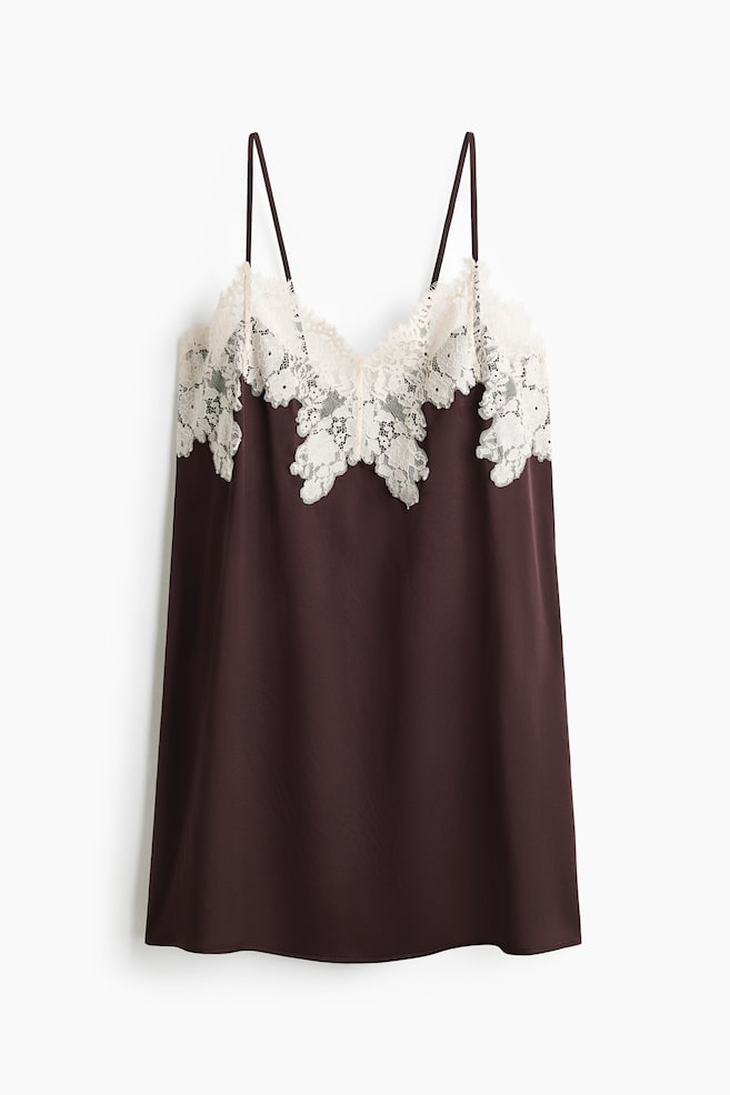 A dark brown satin camisole is shown from the front, featuring thin spaghetti straps and a V-neckline adorned with intricate white floral lace trim. The top has a relaxed, straight silhouette draping downwards. - 1
