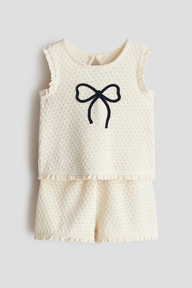 Set 2 pezzi in maglia di cotone traforata - Crema/fiocco - 1