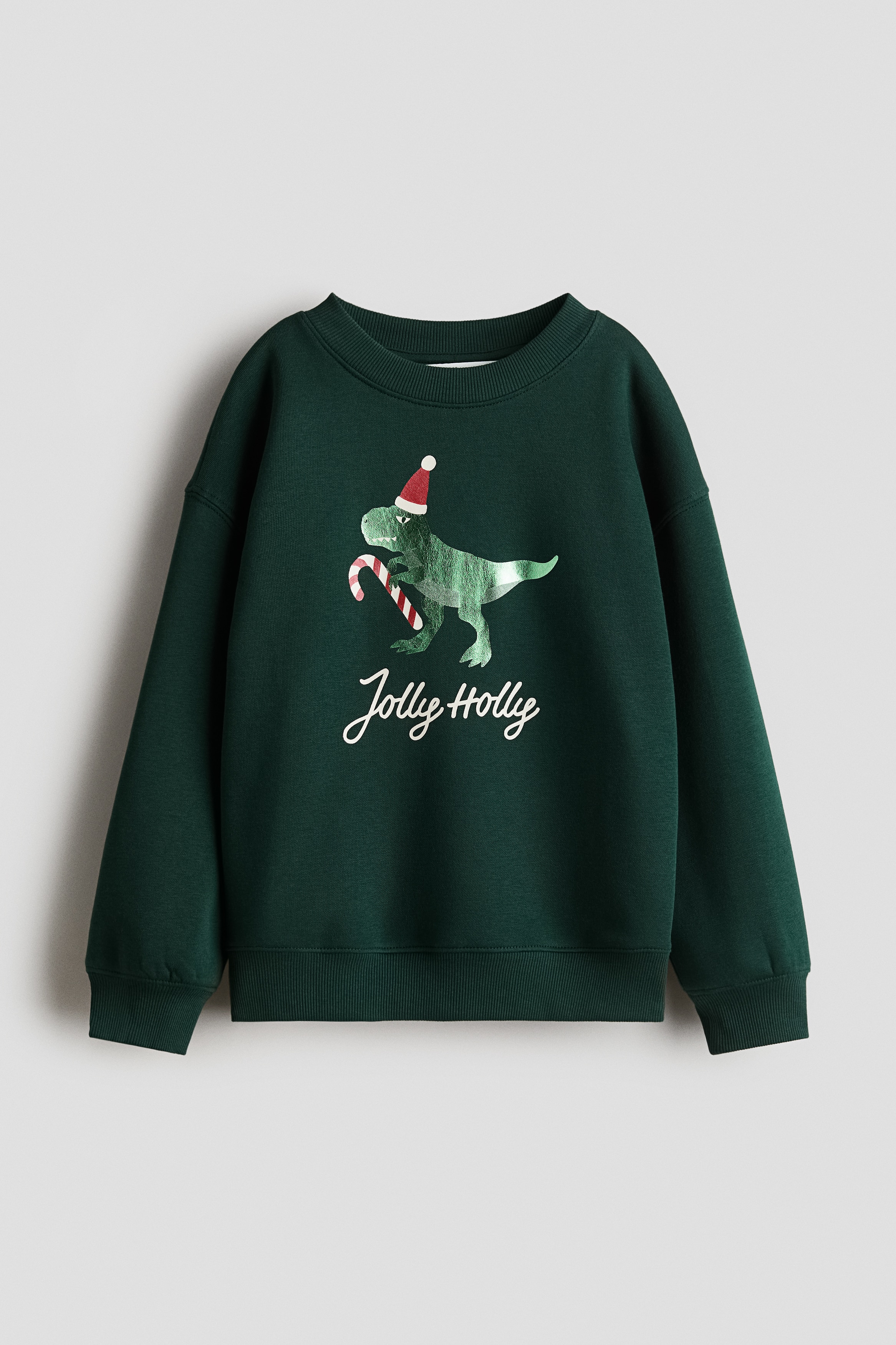 Sweatshirt med tryck - Mörkgrön/Dinosaurie/Ljusbeige/Idrott/Marinblå/Club de tennis/Ljusbeige/NASA/Crèmevit/Svart/Grön/London/Mörkblå/Arizona/Grönrandig/Dinosaurie/Röd/Brooklyn/Marinblå/Dinosaurie/Dark green/Striped/Vit/Triceratops/Ljusbeige/Hund/Mörkgrå/Football legend/Vit/Basketball League/Crèmevit/T-Rex