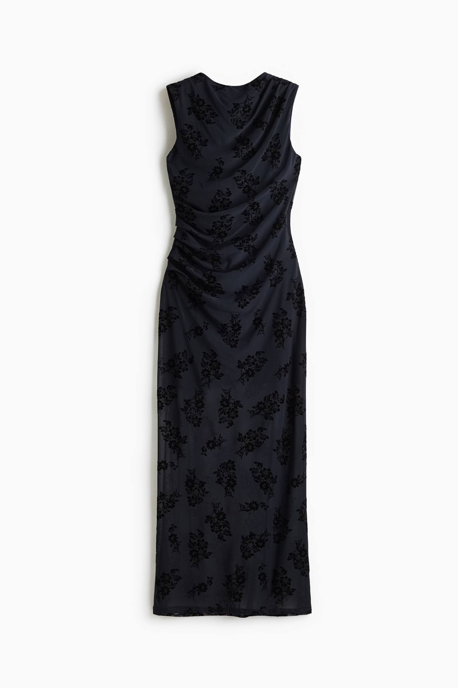 This sleeveless maxi dress, shown from the front, features a dark navy fabric adorned with a textured black floral pattern. The design showcases a draped cowl neckline, side ruching along the bodice and hip, and a straight-cut long skirt.