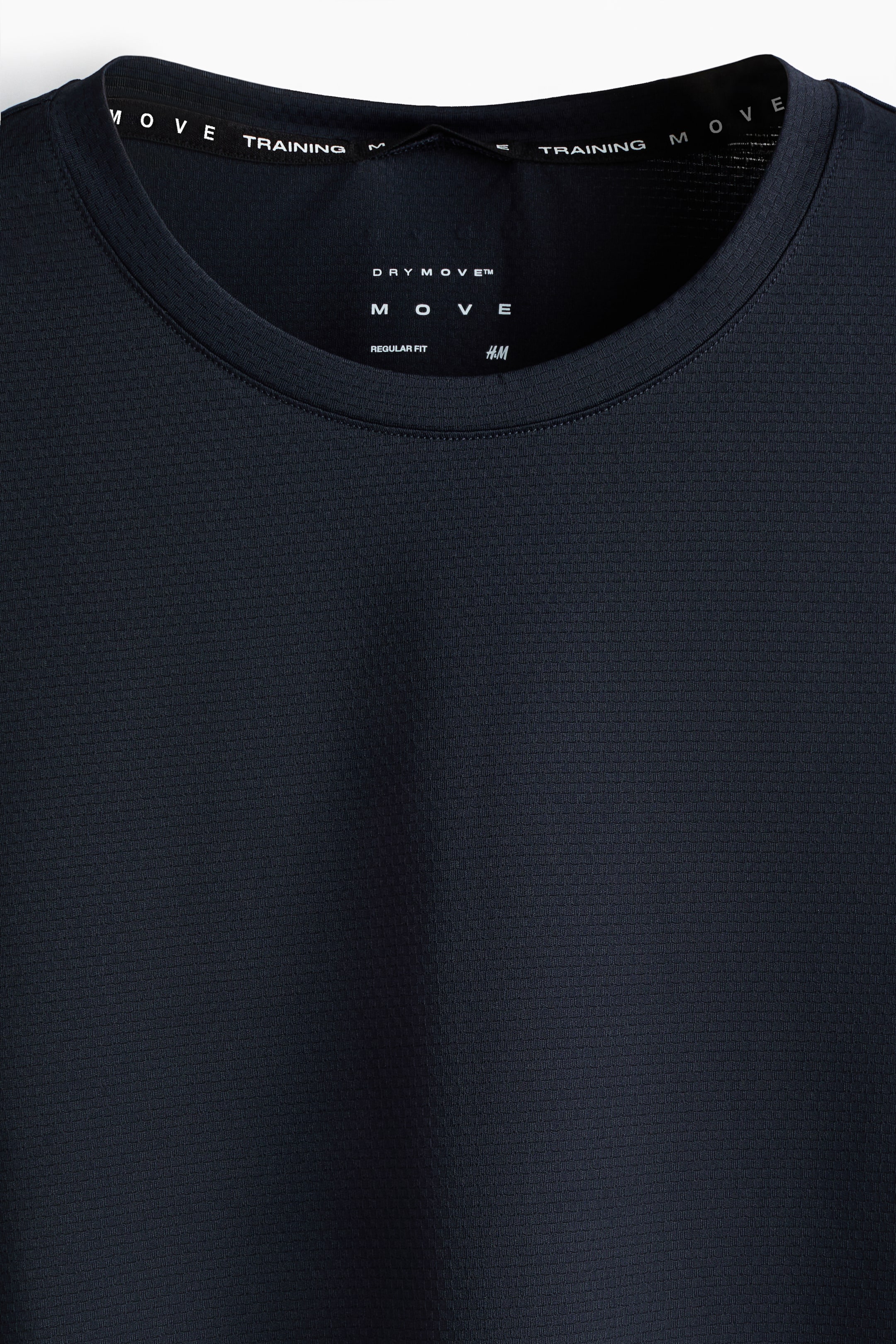 Xem ảnh lớn hơn: Áo ba lỗ thể thao vải DryMove™ Regular Fit - Màu xanh dương đậm - Men | H&M VN 2