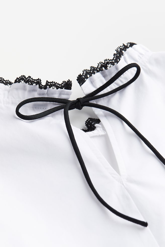 Puff-sleeved peplum blouse - White/Black/Light blue/Striped - 6