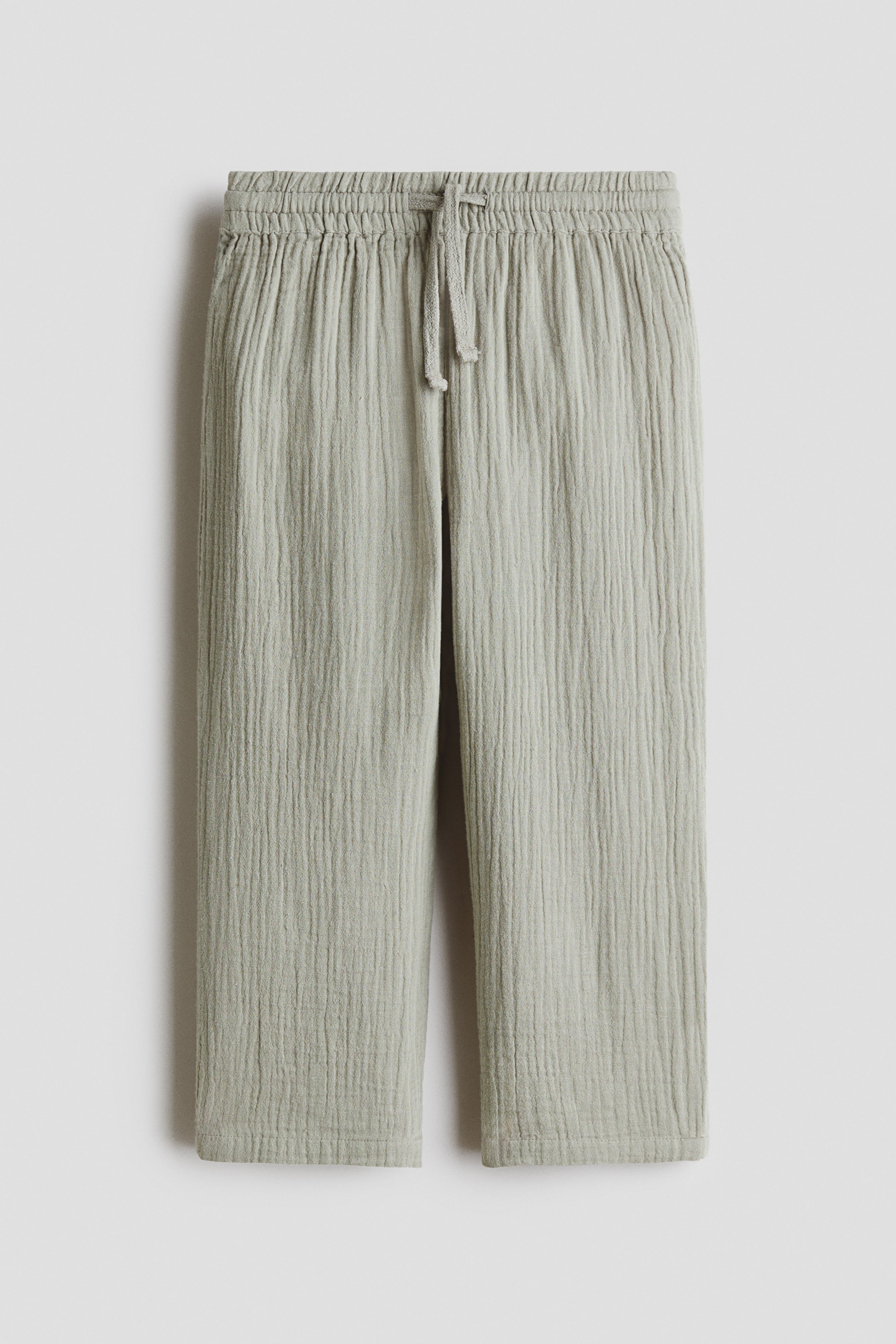 Ver imagen más grande: Joggers en muselina de algodón - Verde empolvado claro - NIÑOS | H&M ES 1