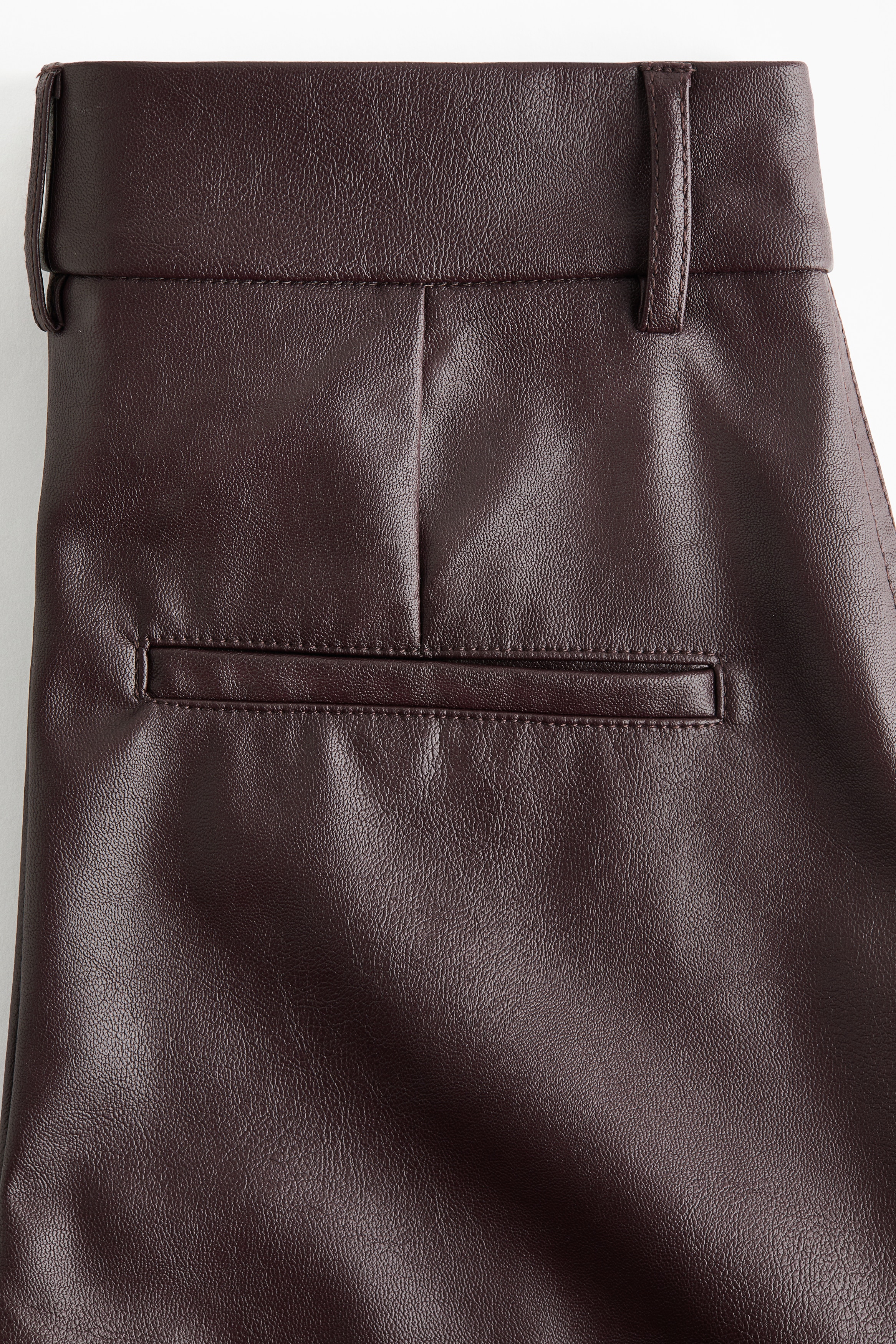Flared coated trousers