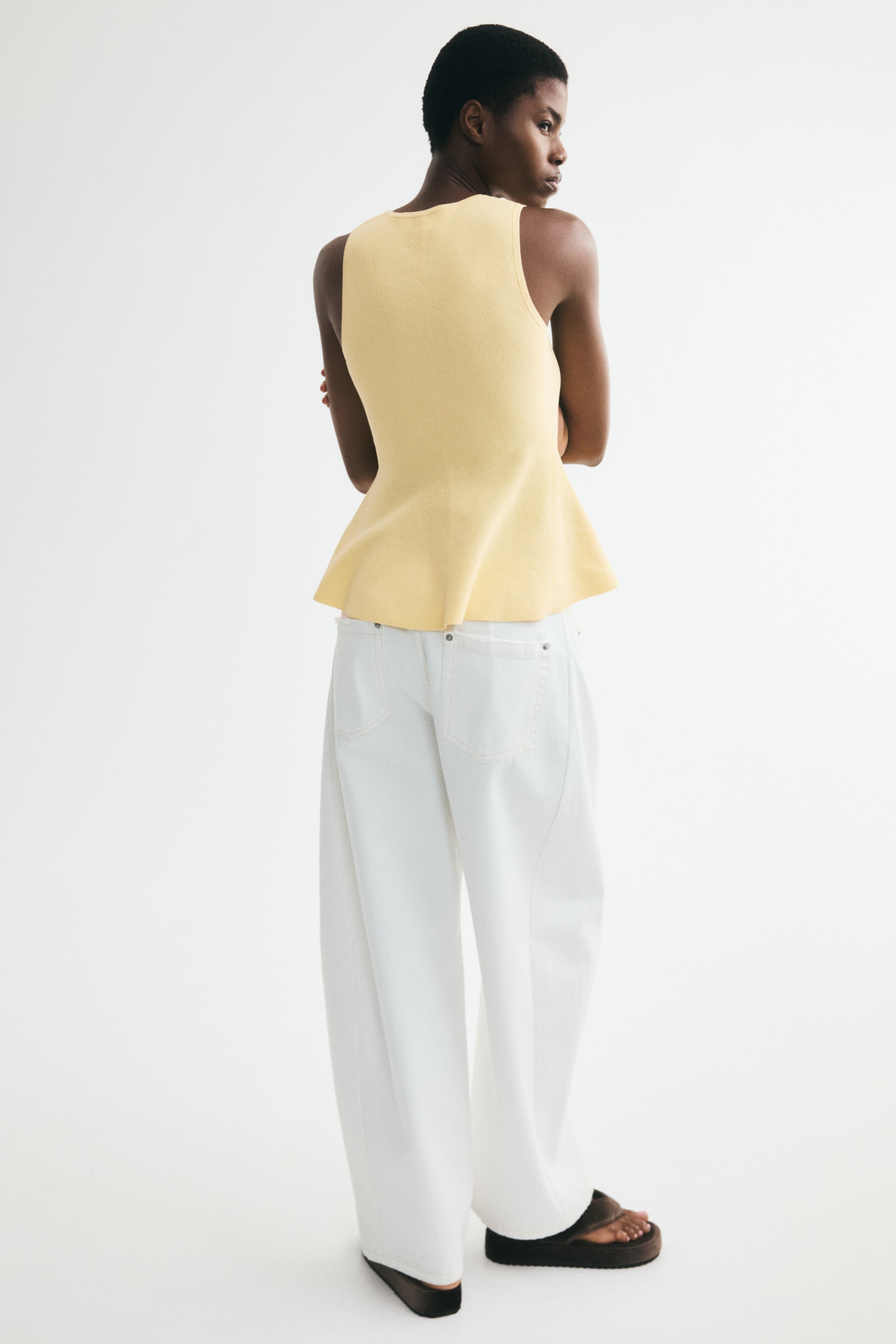 Rib-Knit Peplum Sleeveless Top