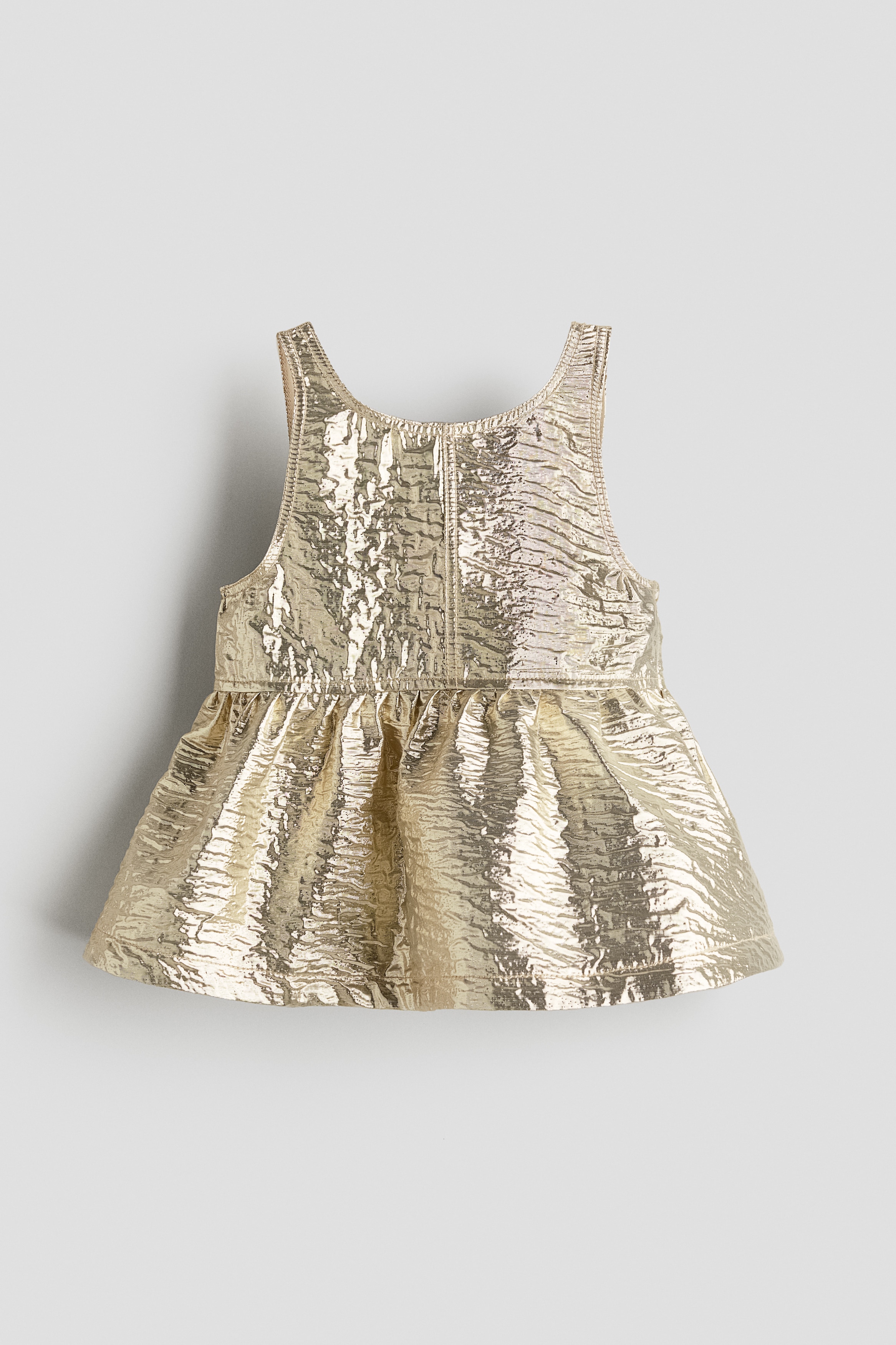 H & M - シマーペプラムトップス - ベージュ H & M - シマーペプラムトップス - ベージュ