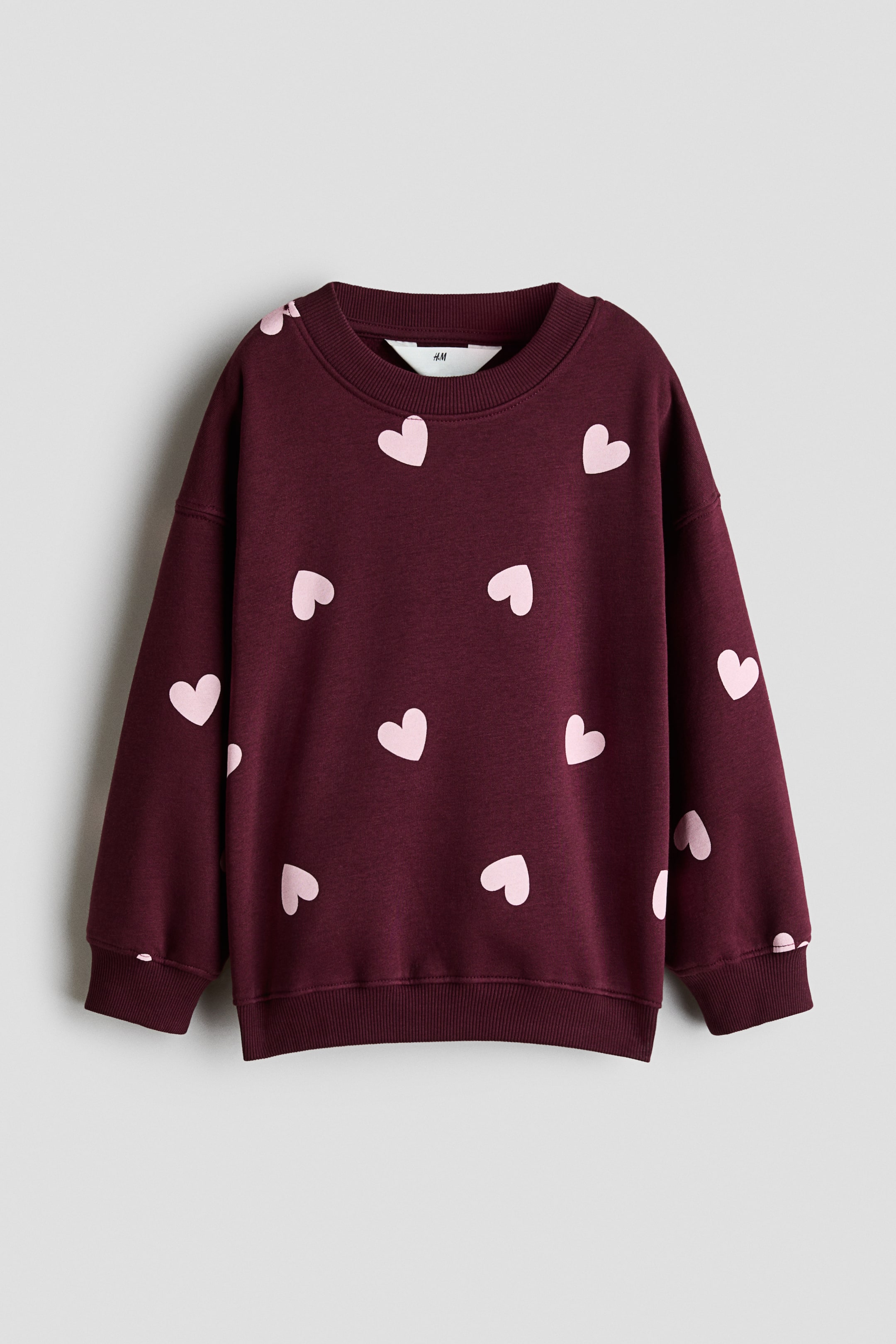 View larger image: Brushed-inside sweatshirt - Dark red/Hearts - Kids | H&M 1