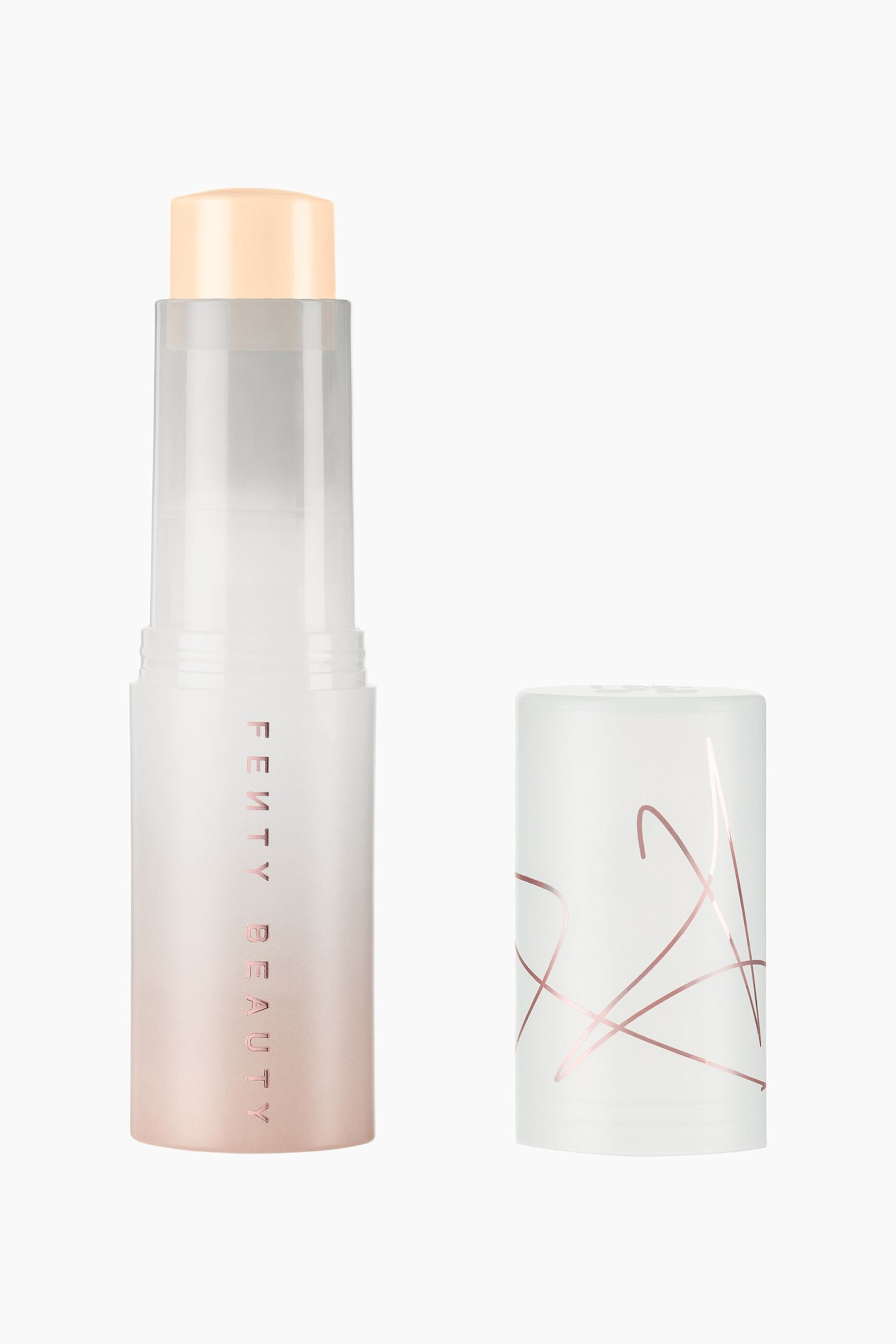 Visa större bild: Eaze Drop Blur + Smooth Tint Stick står upprätt och visar en ljusbeige krämig makeup-stick som sticker ut ur en halvt genomskinlig innerskammare. Ytterröret har en frostad gradient som övergår från vitt till roséguld med vertikal varumärkeslogotyp, medan den löstagna frostade vita korken står bredvid och visar abstrakta metalliska linjer i roséguld.