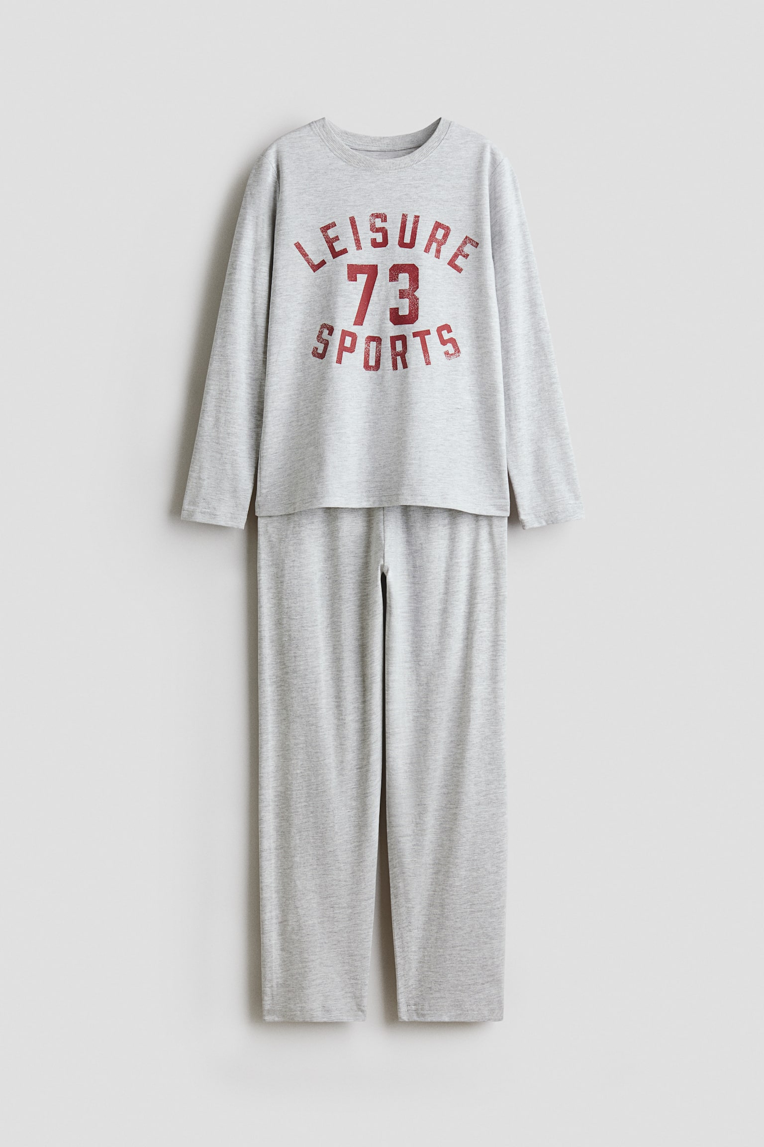 Bedruckter Pyjama aus Baumwolle - Hellgraumeliert/Leisure Sports