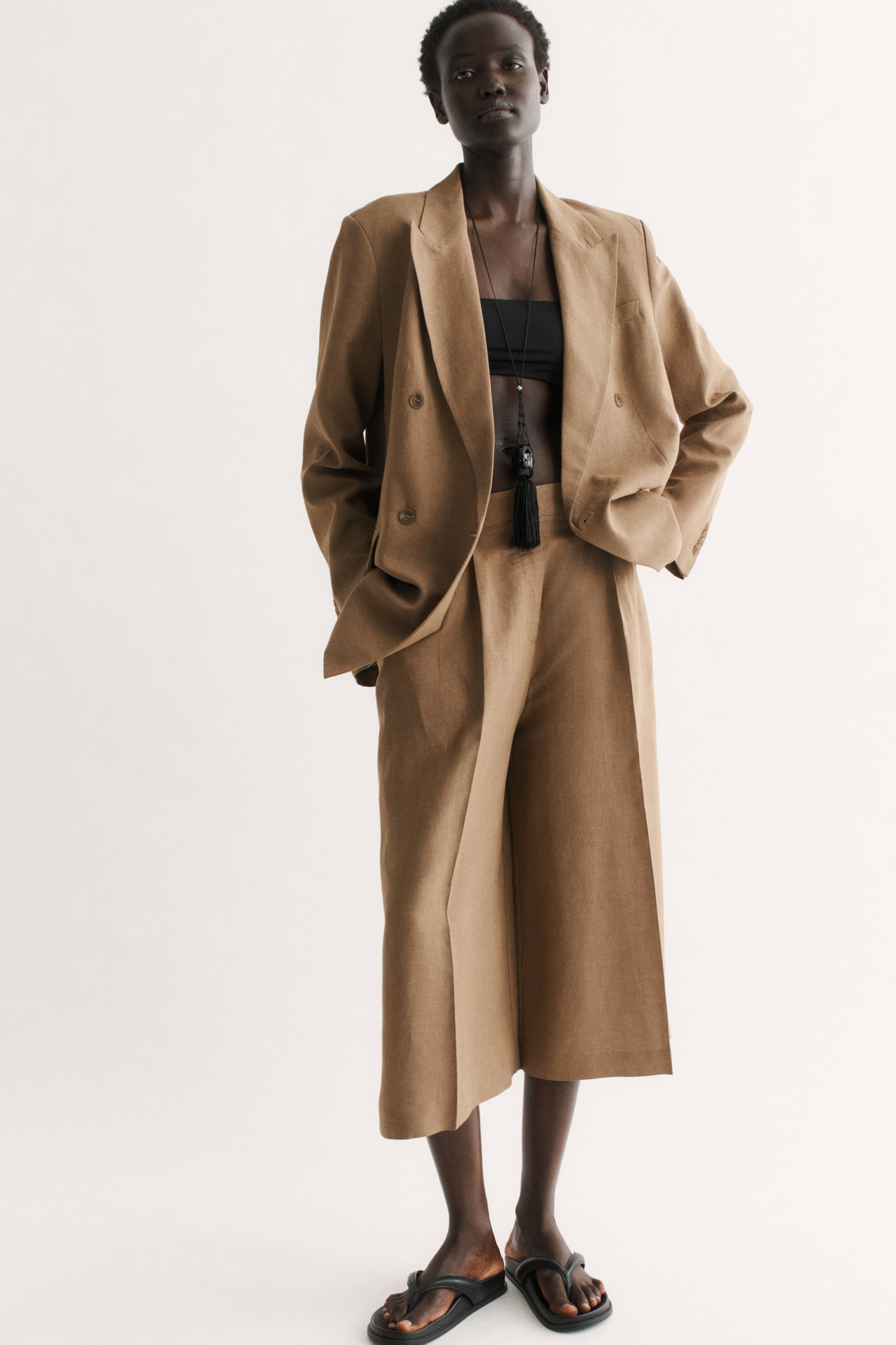 Visualizza l'immagine ingrandita: Pantaloni ampi sartoriali in misto lino - Beige - DONNA | H&M CH 1