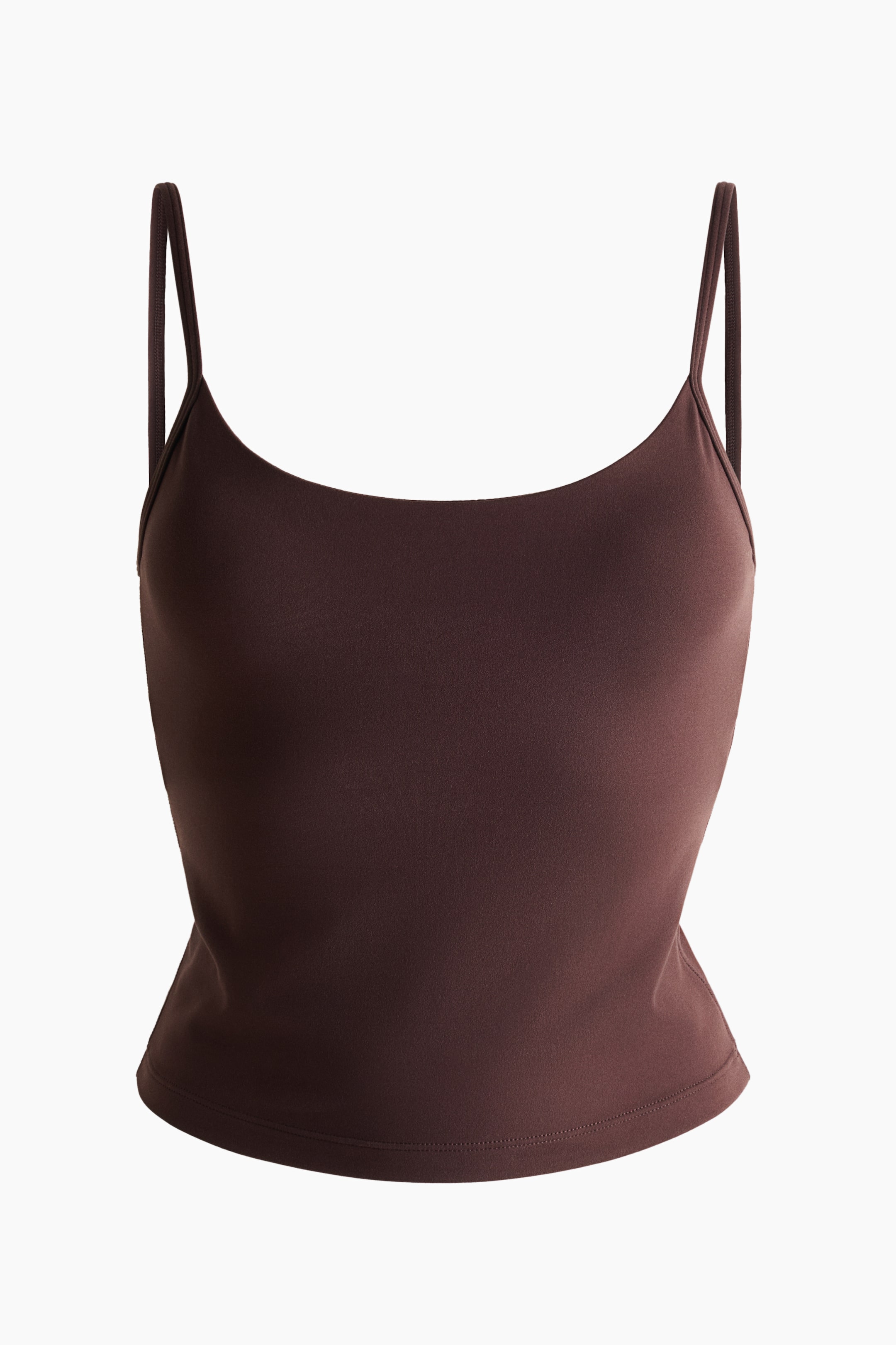 View larger image: The integral-bra sports strappy top with SoftMove showcases FRONT in a rich brown hue. It features slender spaghetti straps, a broad scoop neckline, and a fitted, cropped silhouette with a straight hem.