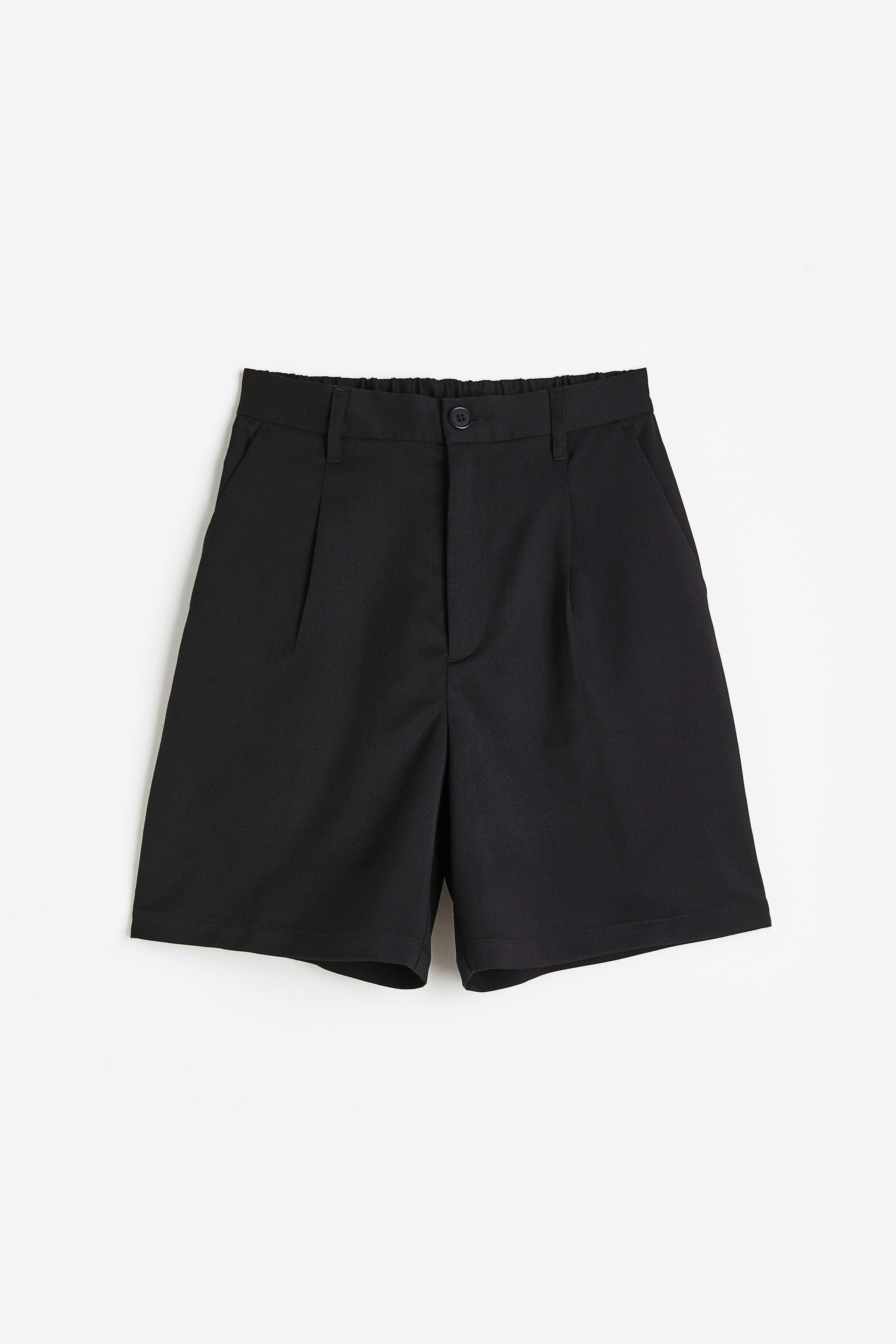 Short noir femme habillé sale