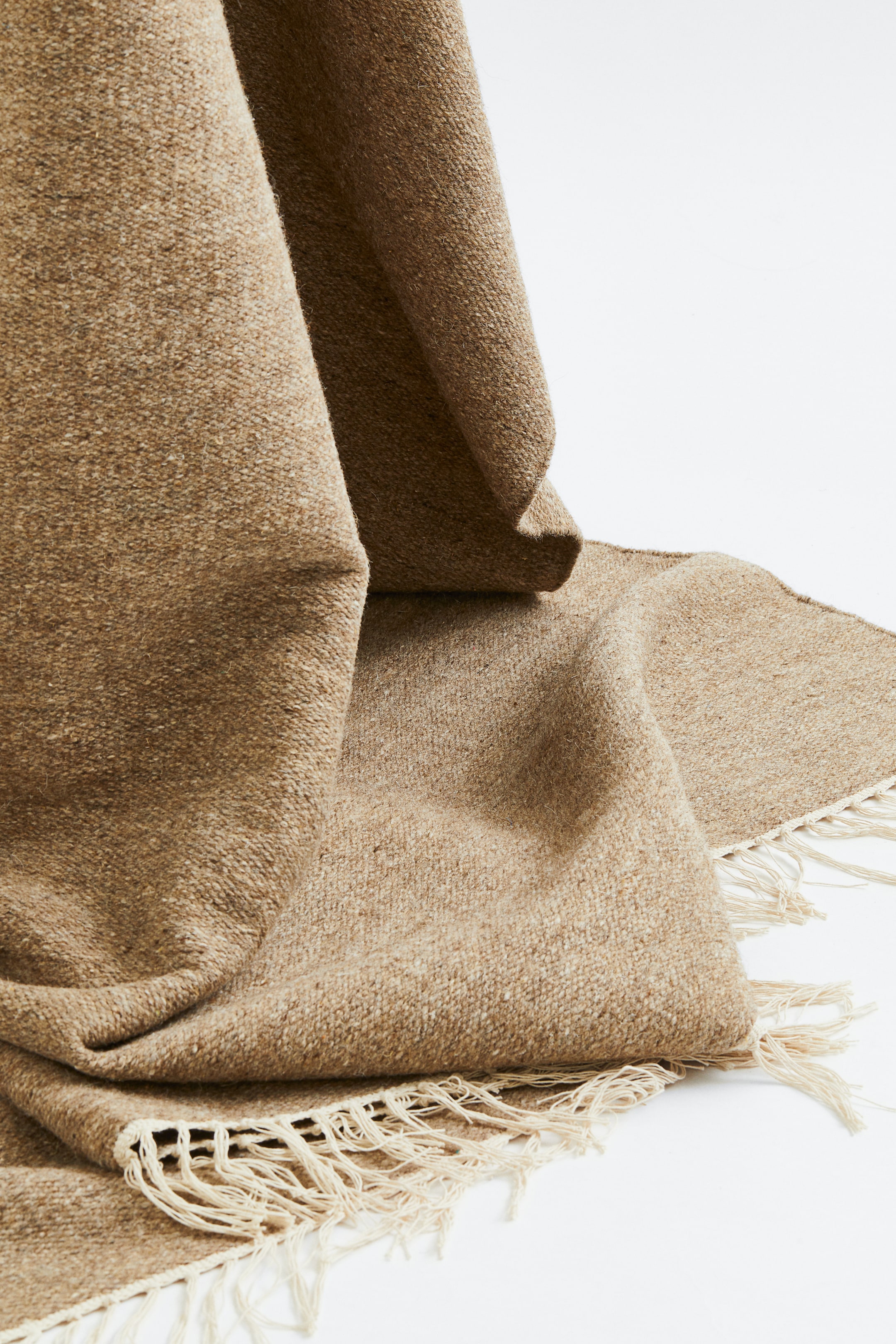 Dark beige Large Wool Rug at H&M Home | H&M US