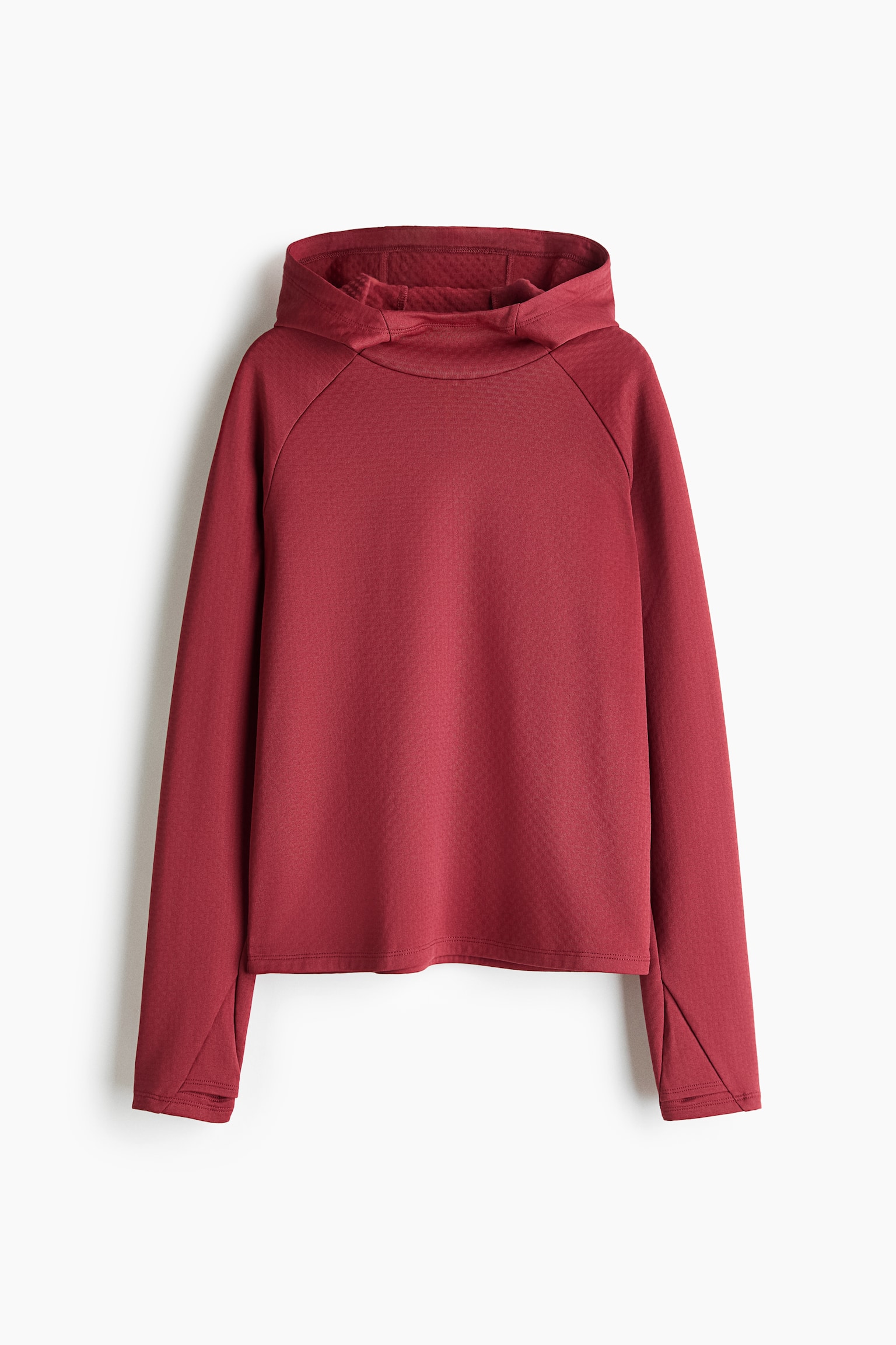 A dark red hoodie is shown from the front, showcasing long raglan sleeves with geometric seam details at the cuffs and a structured crossover hood. The sweatshirt features a clean, straight hemline and a relaxed fit. - 1