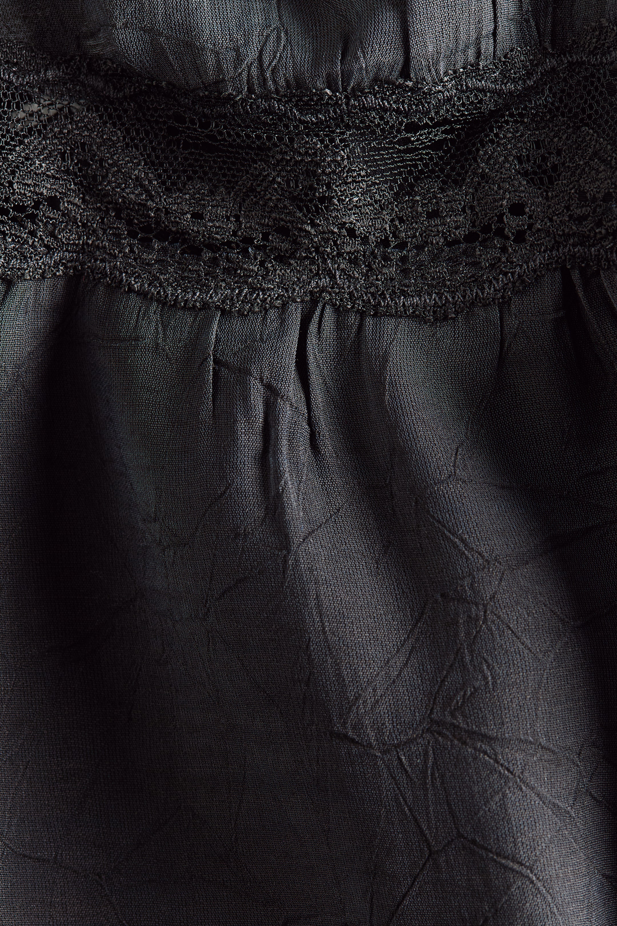 Lace-Trimmed Peplum Top