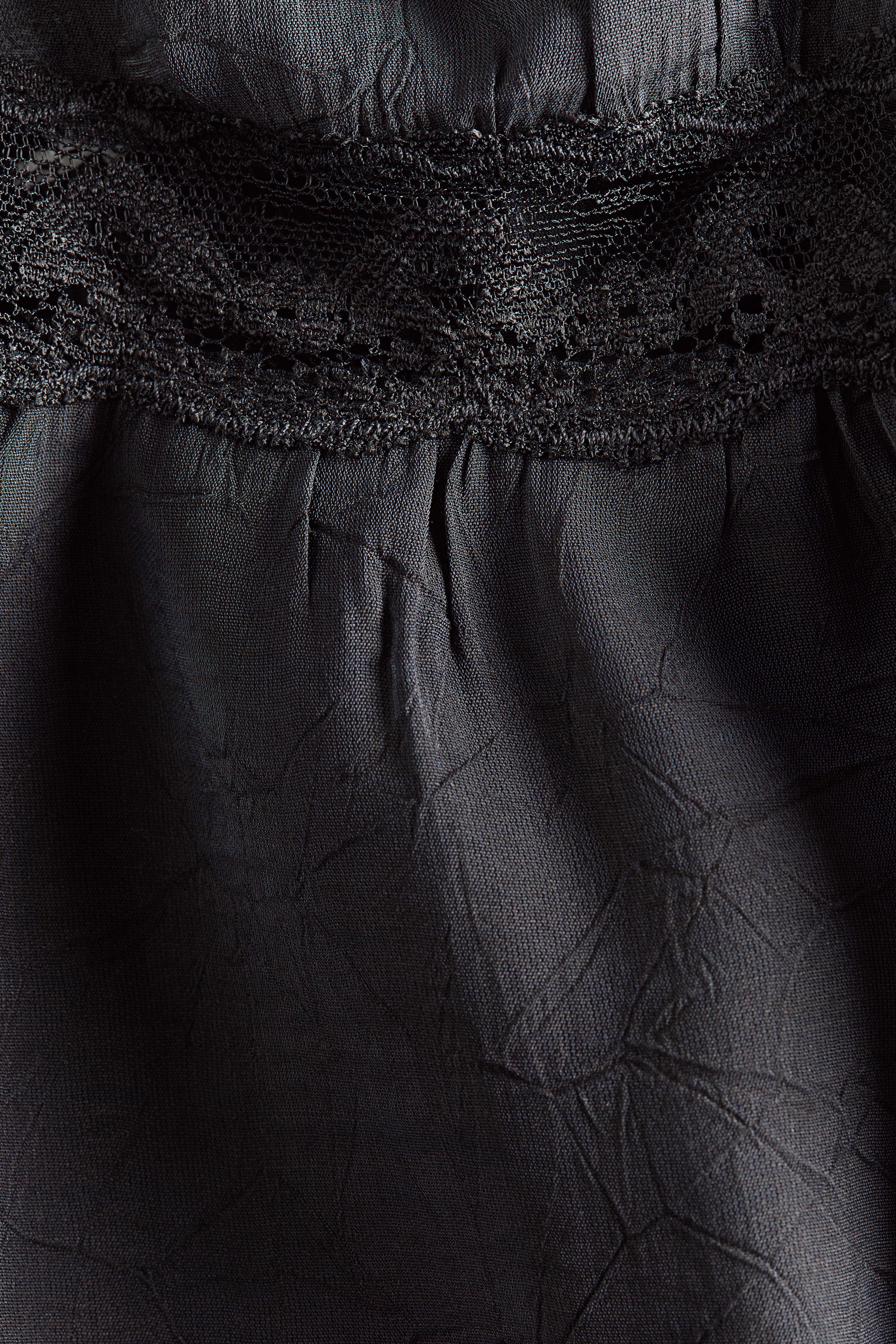 Lace-Trimmed Peplum Top