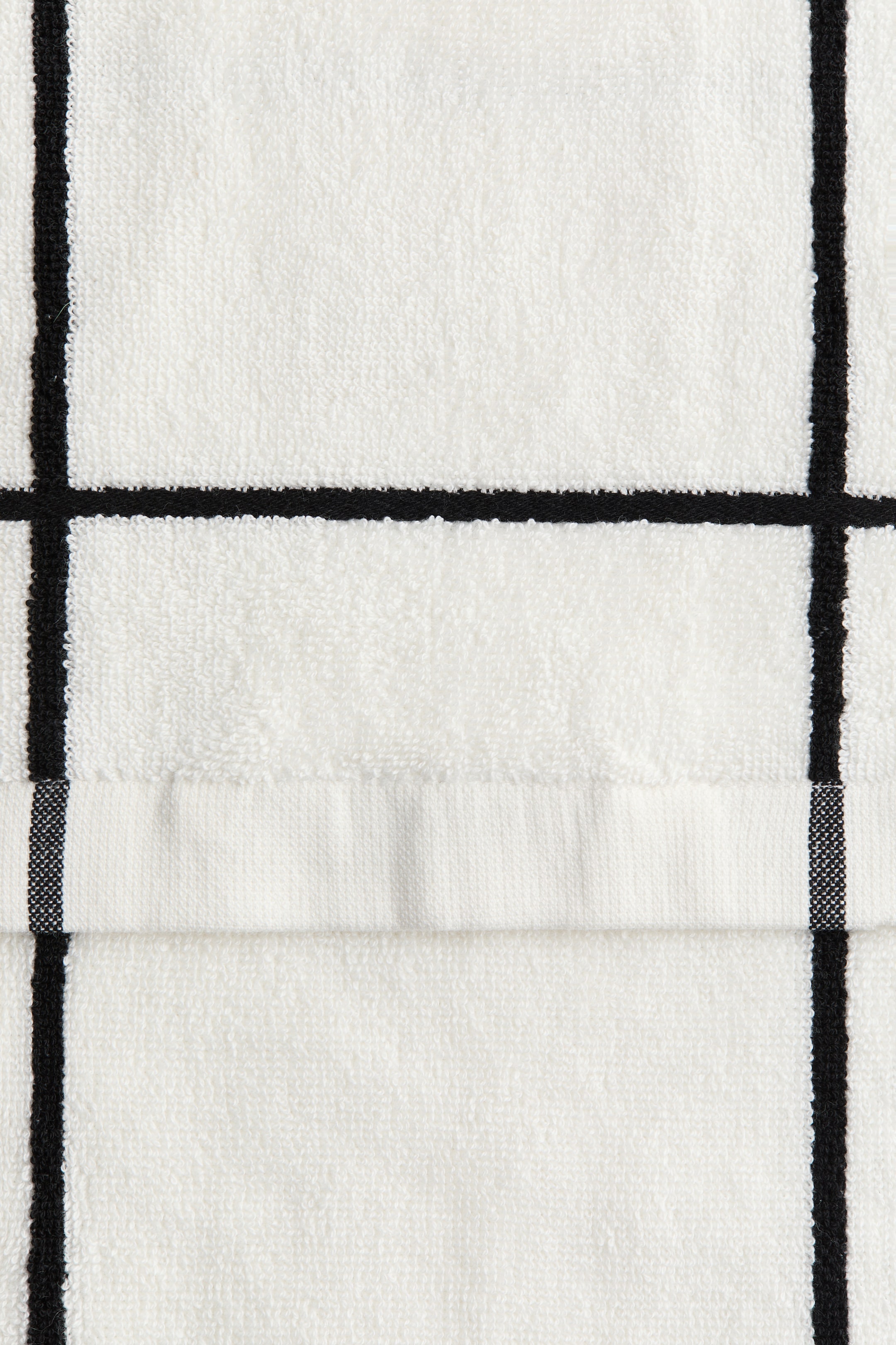 Serviette à motif quadrillé