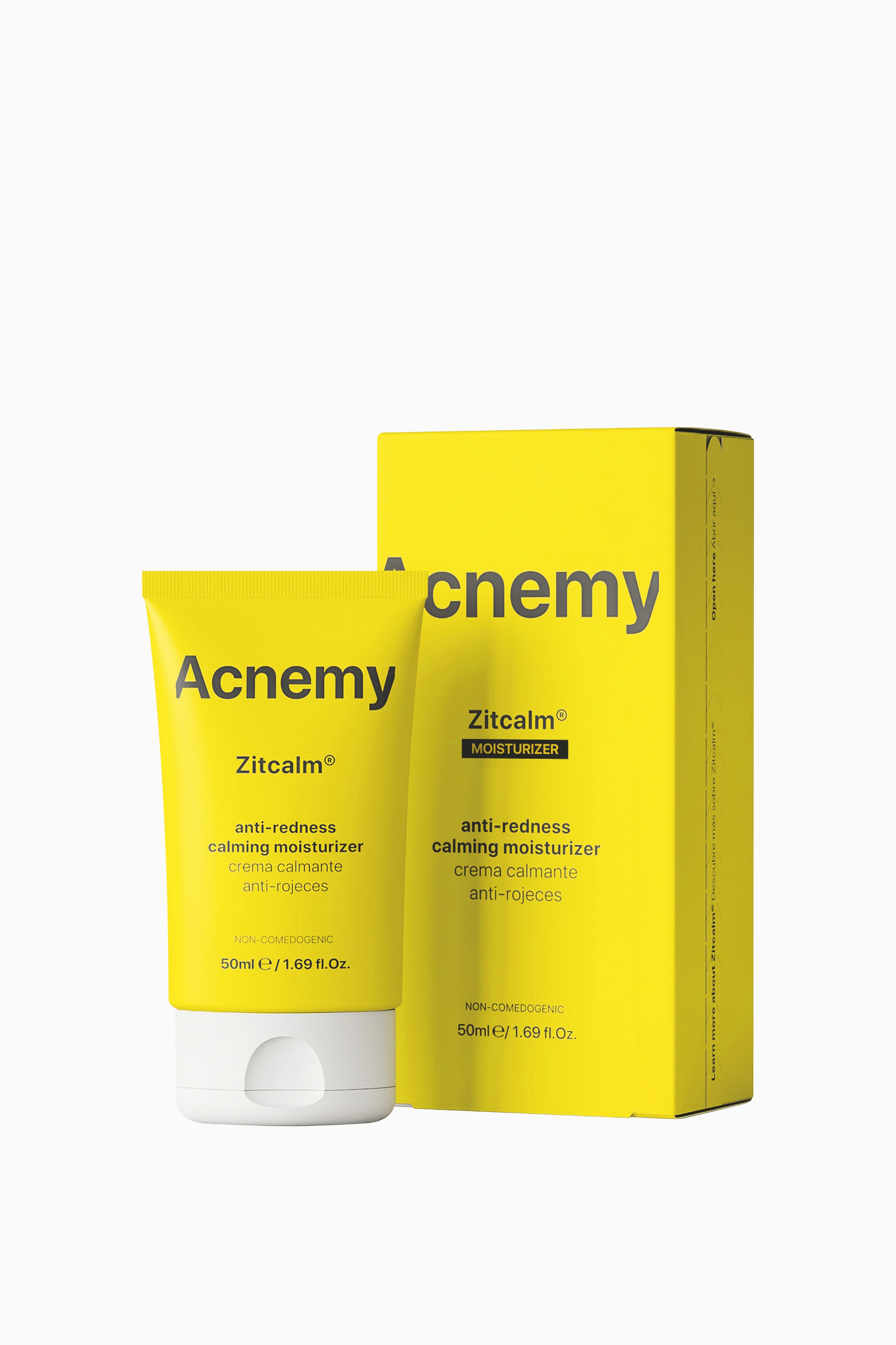 Vis større bilde: Acnemy Zitcalm Moisturizer står oppreist i en lys neon gul klemmetube med hvit flip-top-kork, plassert ved siden av den tilhørende rektangulære esken. Begge produktene vender forover og fremhever svart merkevaretekst og produktdetaljer på den livlige gule emballasjen.