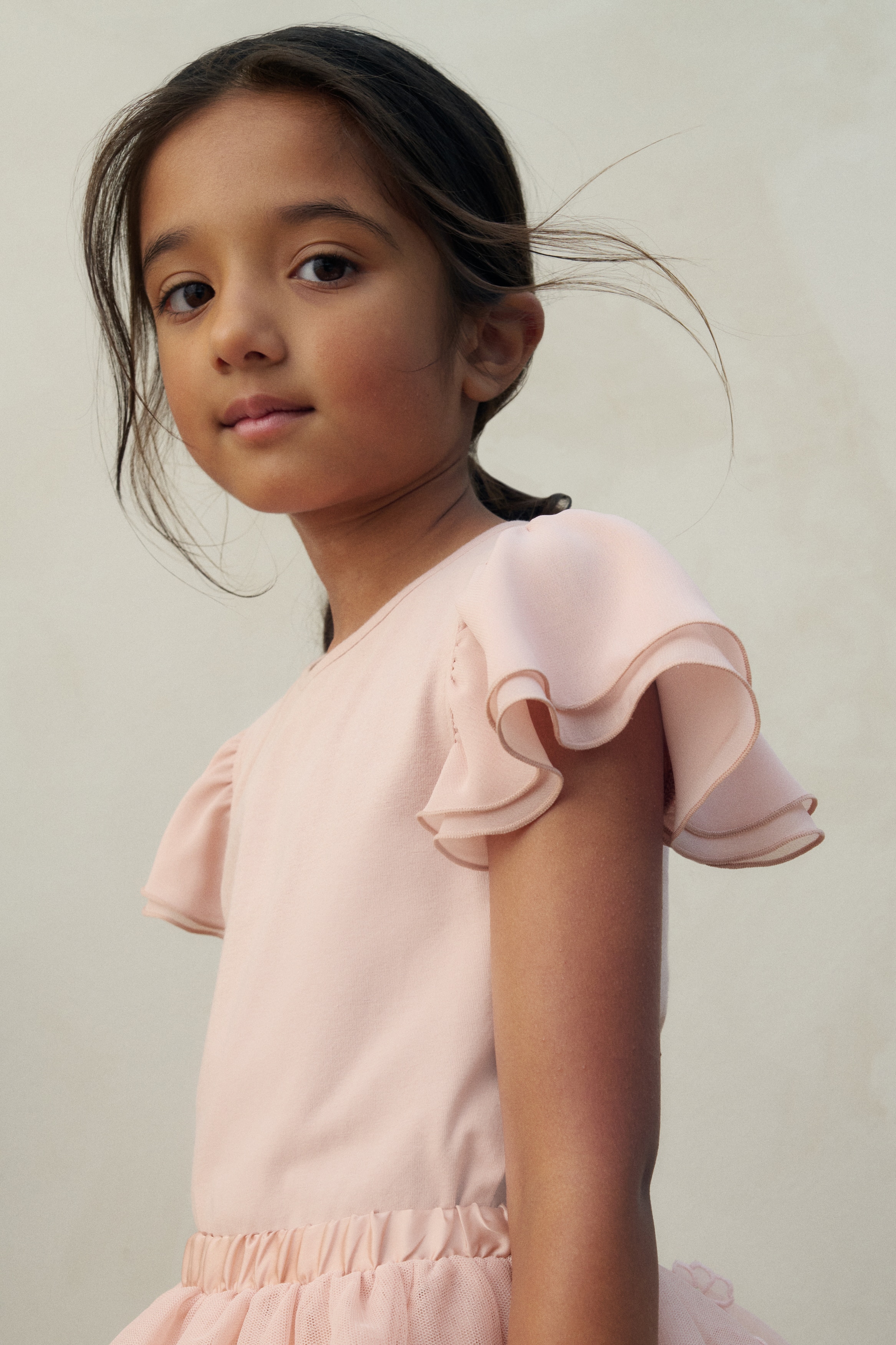 Butterfly-sleeved top