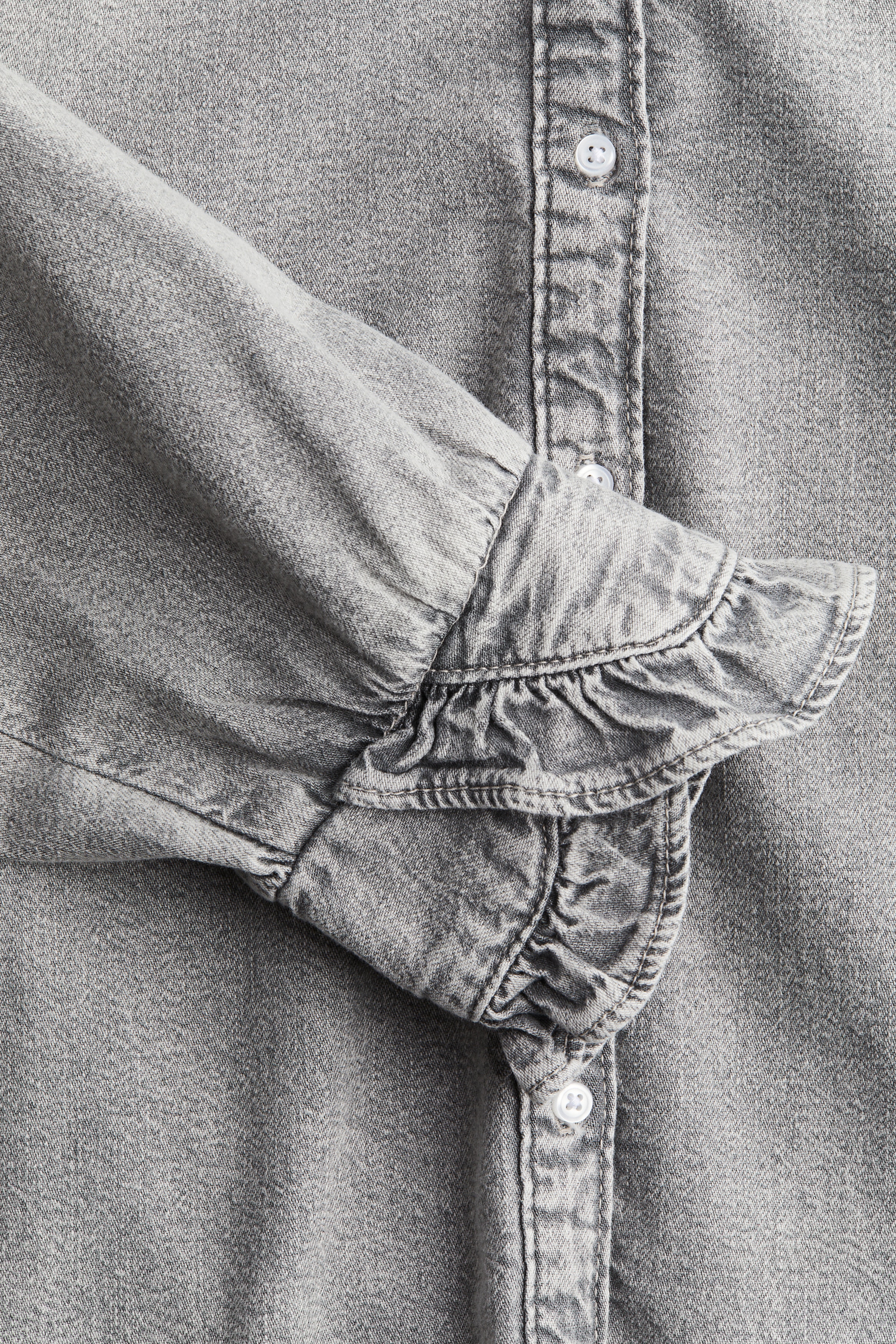 Frill-trimmed denim blouse