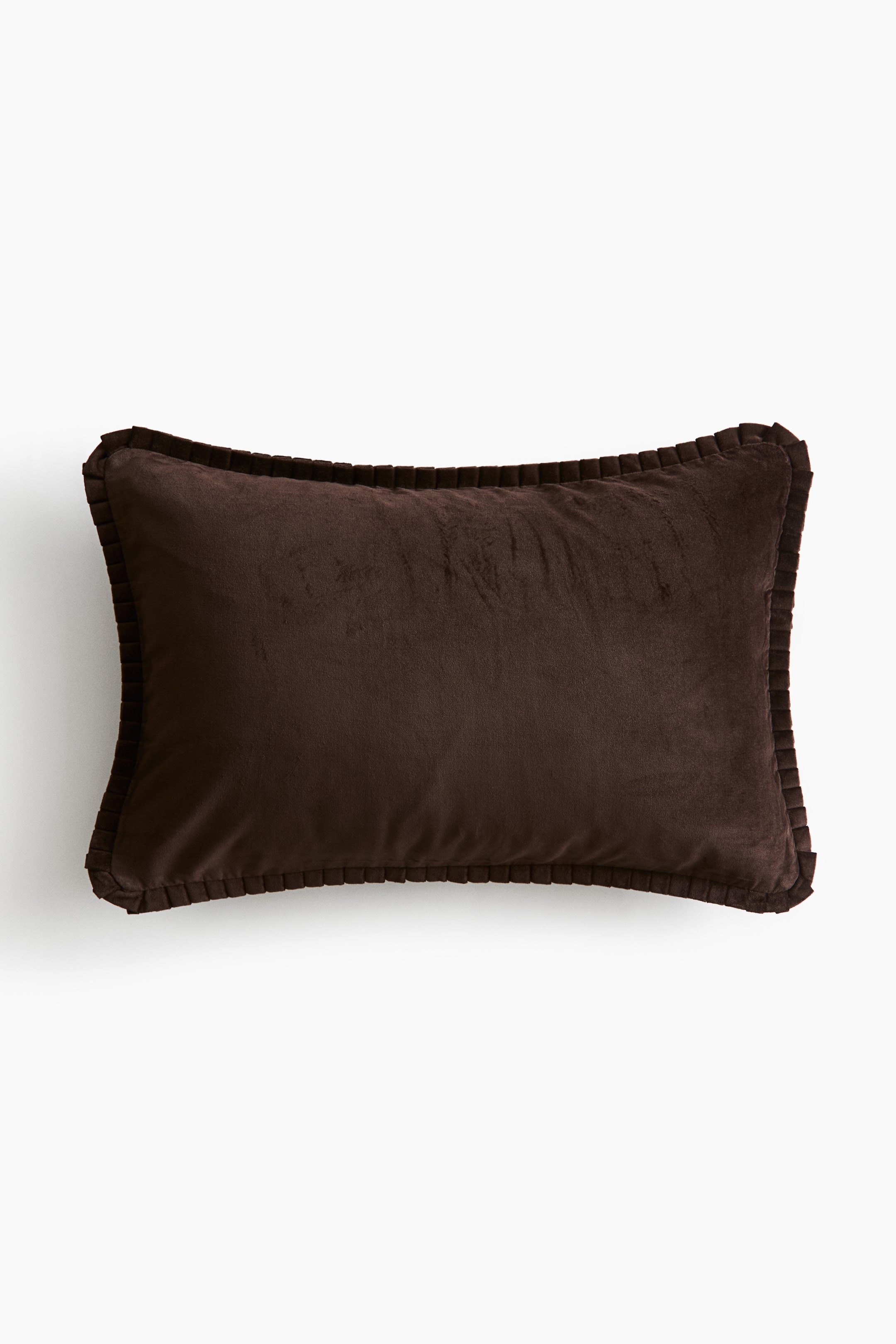 View larger image: A rectangular cushion cover in dark brown velvet is facing forwards, featuring a soft, plush texture and a matching pleated border running along the edges.