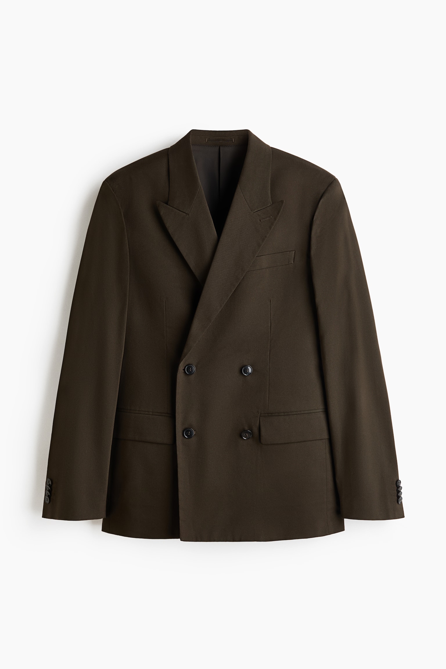 A dark olive green double-breasted jacket is presented facing front. It is featuring peak lapels with a decorative buttonhole, a jetted chest pocket, two jetted front pockets with flaps, and decorative buttons adorning the cuffs. - 1