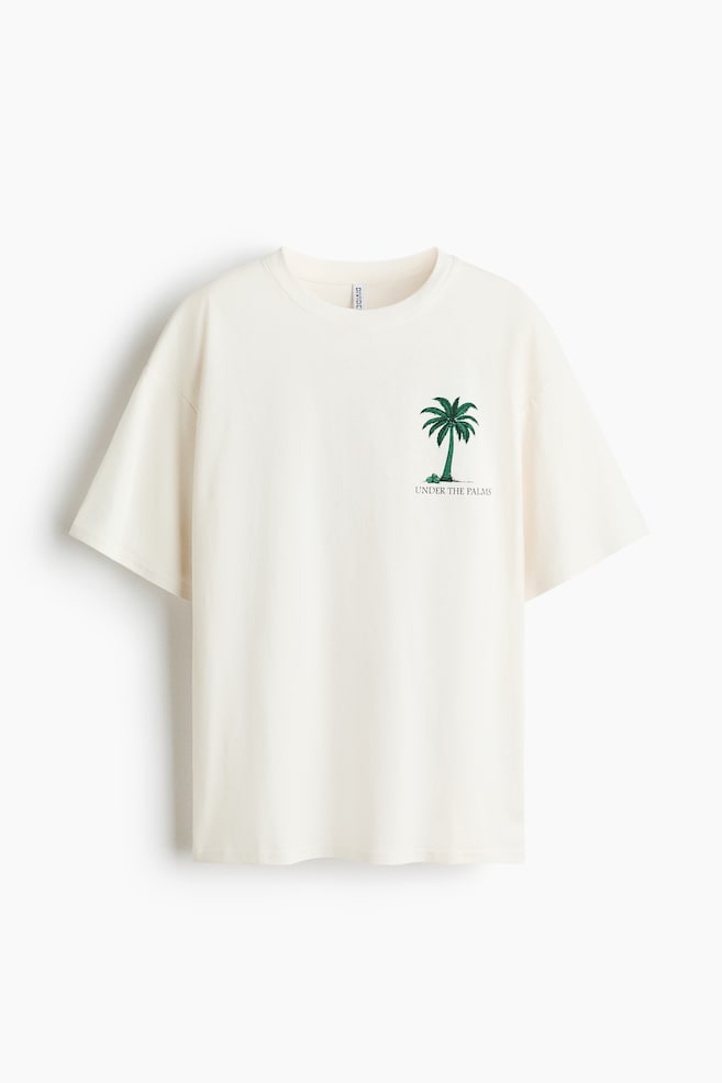 T-shirt ample imprimé - Blanc/palmiers/Gris chiné/rayé/Bleu/texte Vitamin Sea/Vert clair/The Perfect Matcha/Gris foncé/palmier/Brun foncé/soleil/Jaune clair/Vacanze/Jaune pâle/The New Issue/Crème/coquillages/Crème/âme de l'océan/Brun foncé/Bahía Feliz/Turquoise clair/Del Mare/Turquoise foncé/Palo Alto - 1