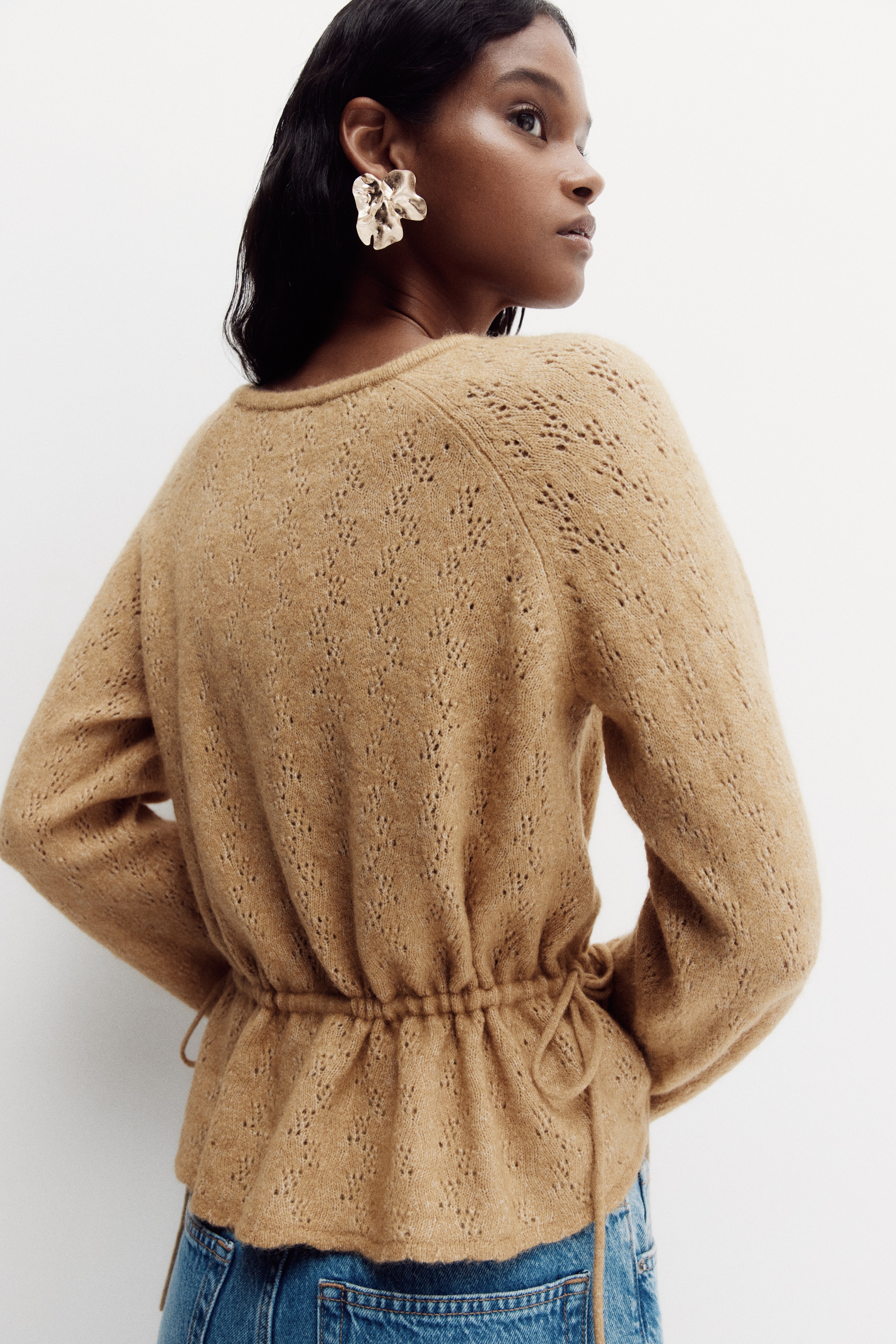 Pullover con peplum in maglia traforata - Beige