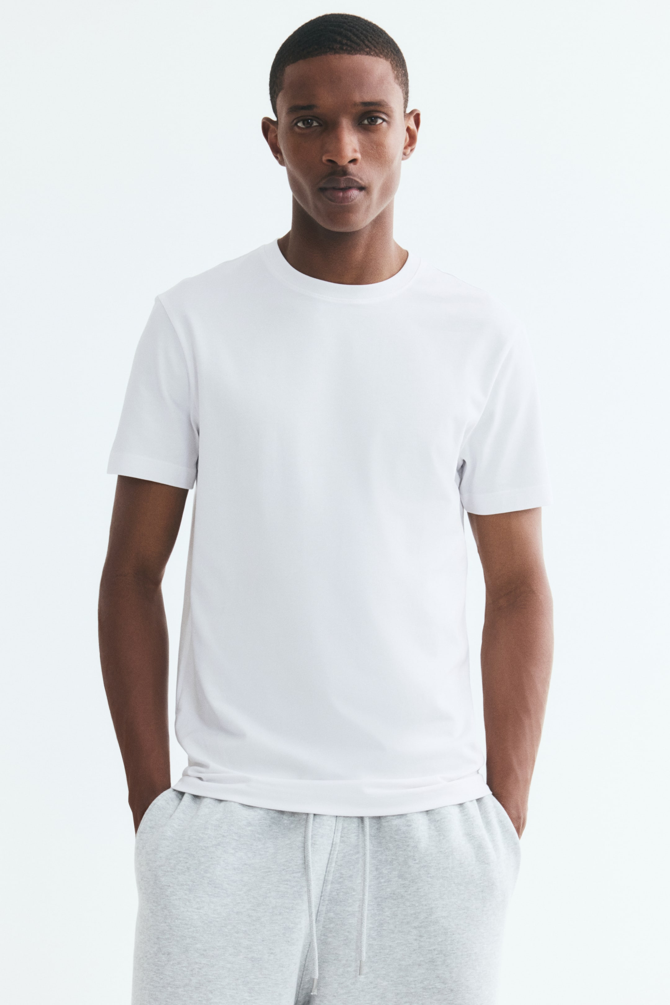 View larger image: COOLMAX® Slim Fit T-shirt - White - Men | H&M 1