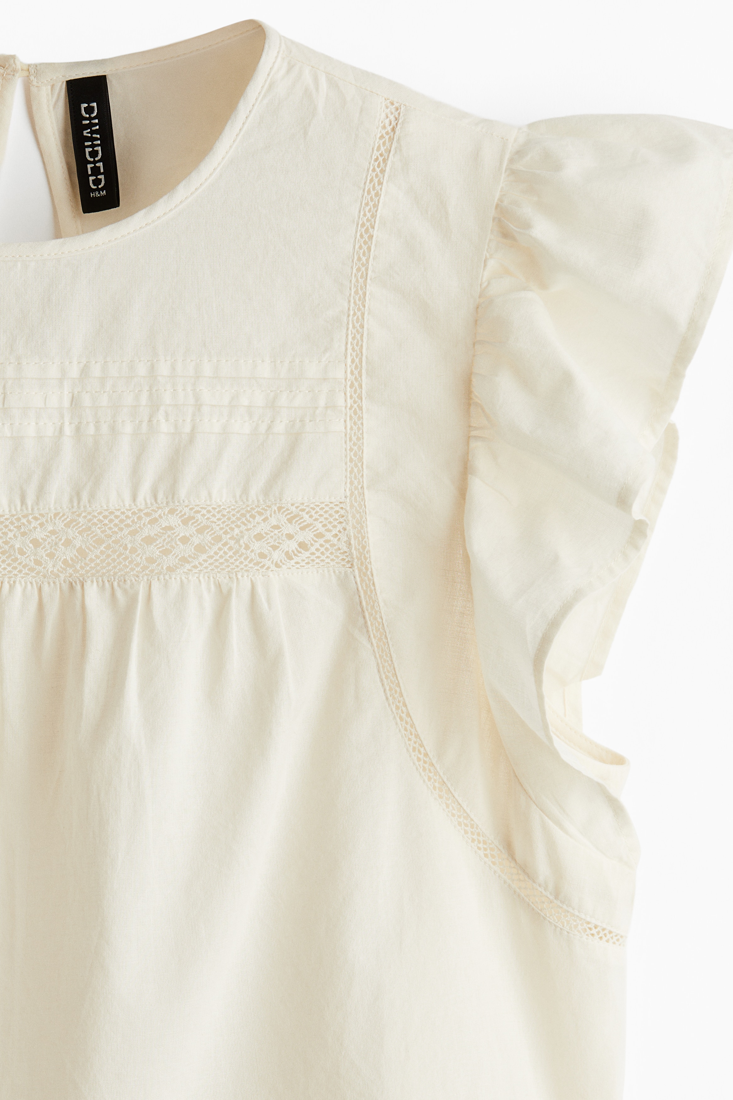 Lace-inset peplum blouse