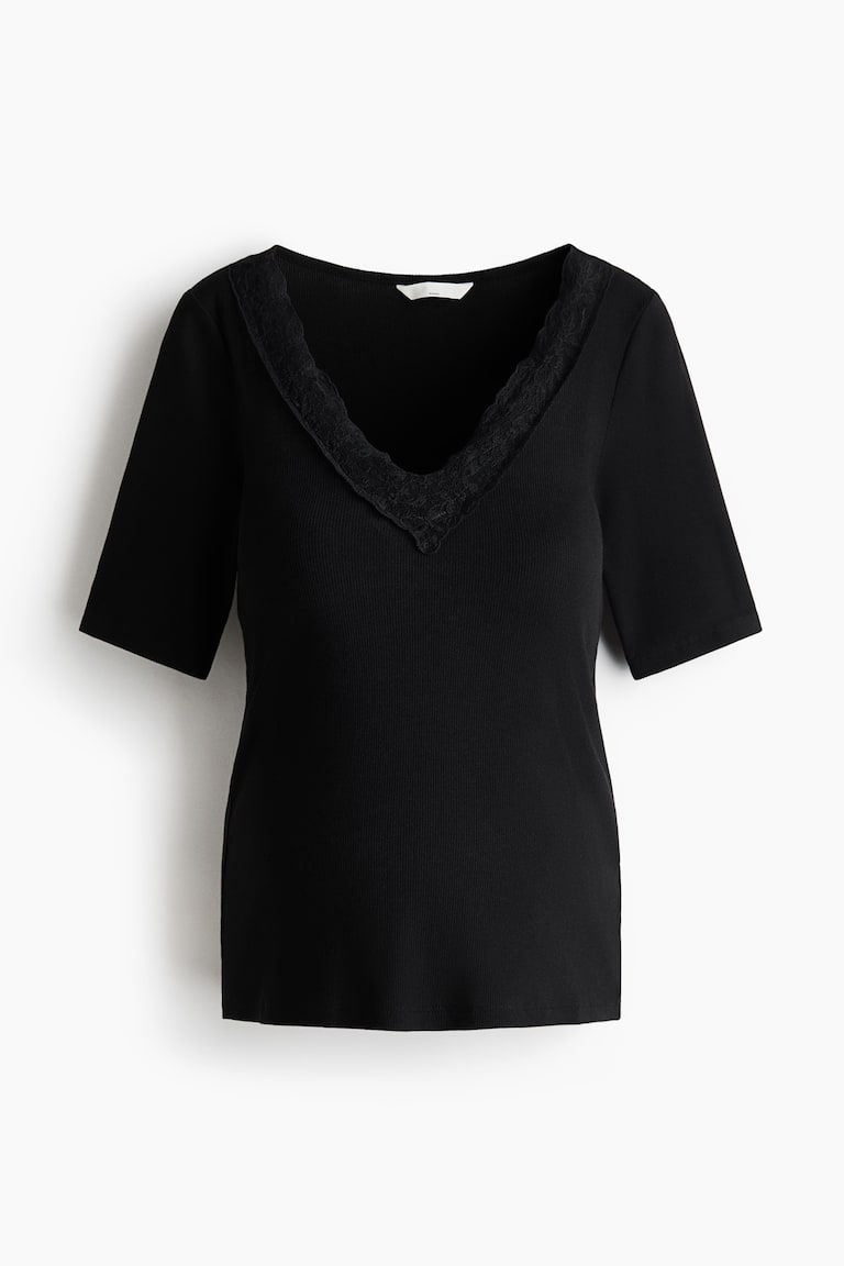 MAMA Rebrasta bluza s V-izrezom