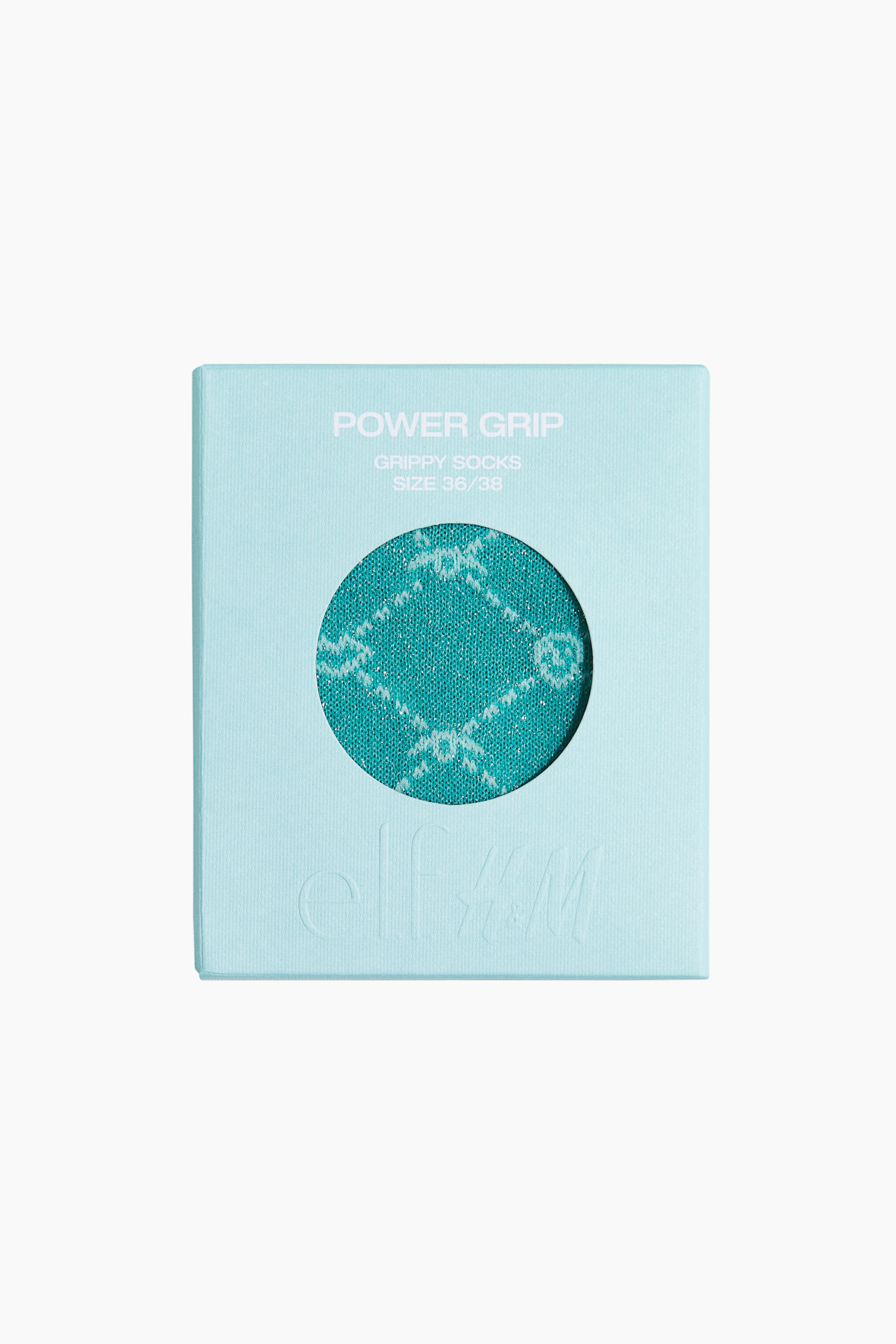 View larger image: Sheer, glittery teal socks show a white diamond pattern through a circular cutout in their light-blue front packaging, which is labeled 'POWER GRIP GRIPPY SOCKS' and indicates an anti-slip feature.