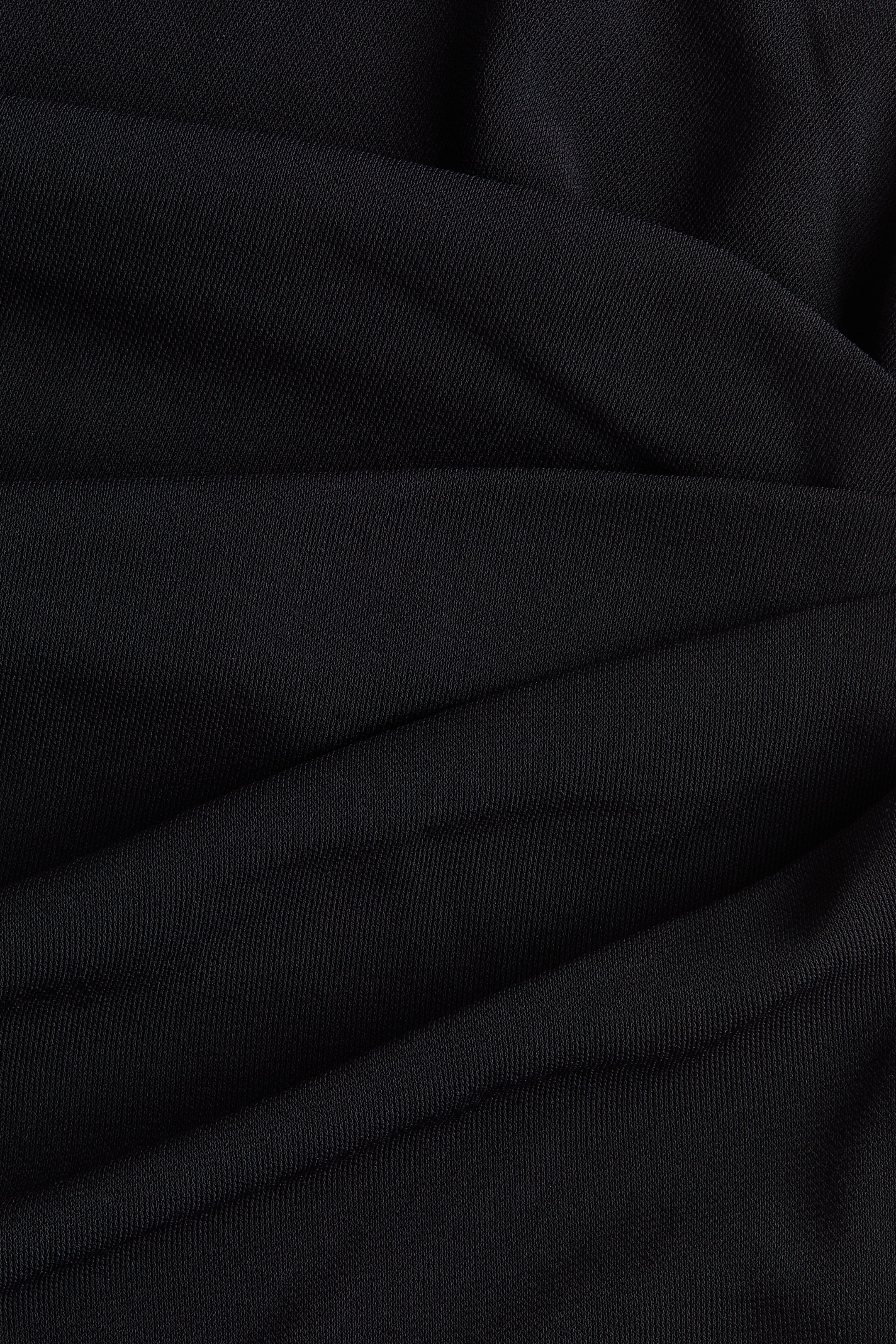 Robe asymétrique en jersey point de Rome