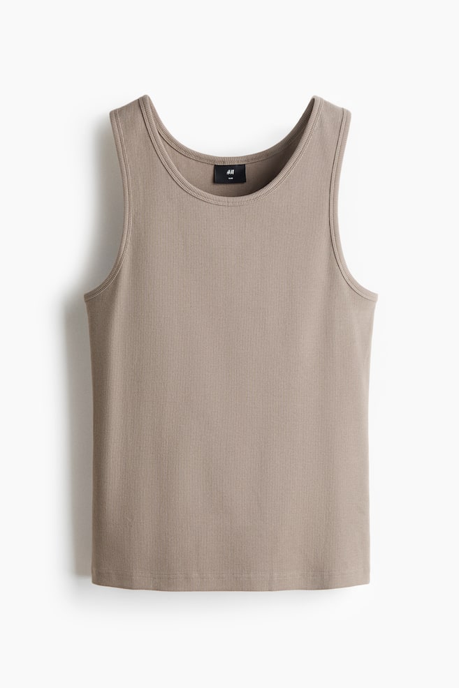 A slim-fit vest top in light brown ribbed cotton jersey is being shown from the front, featuring a round neckline and armholes finished with narrow binding, and a straight hem. - 1