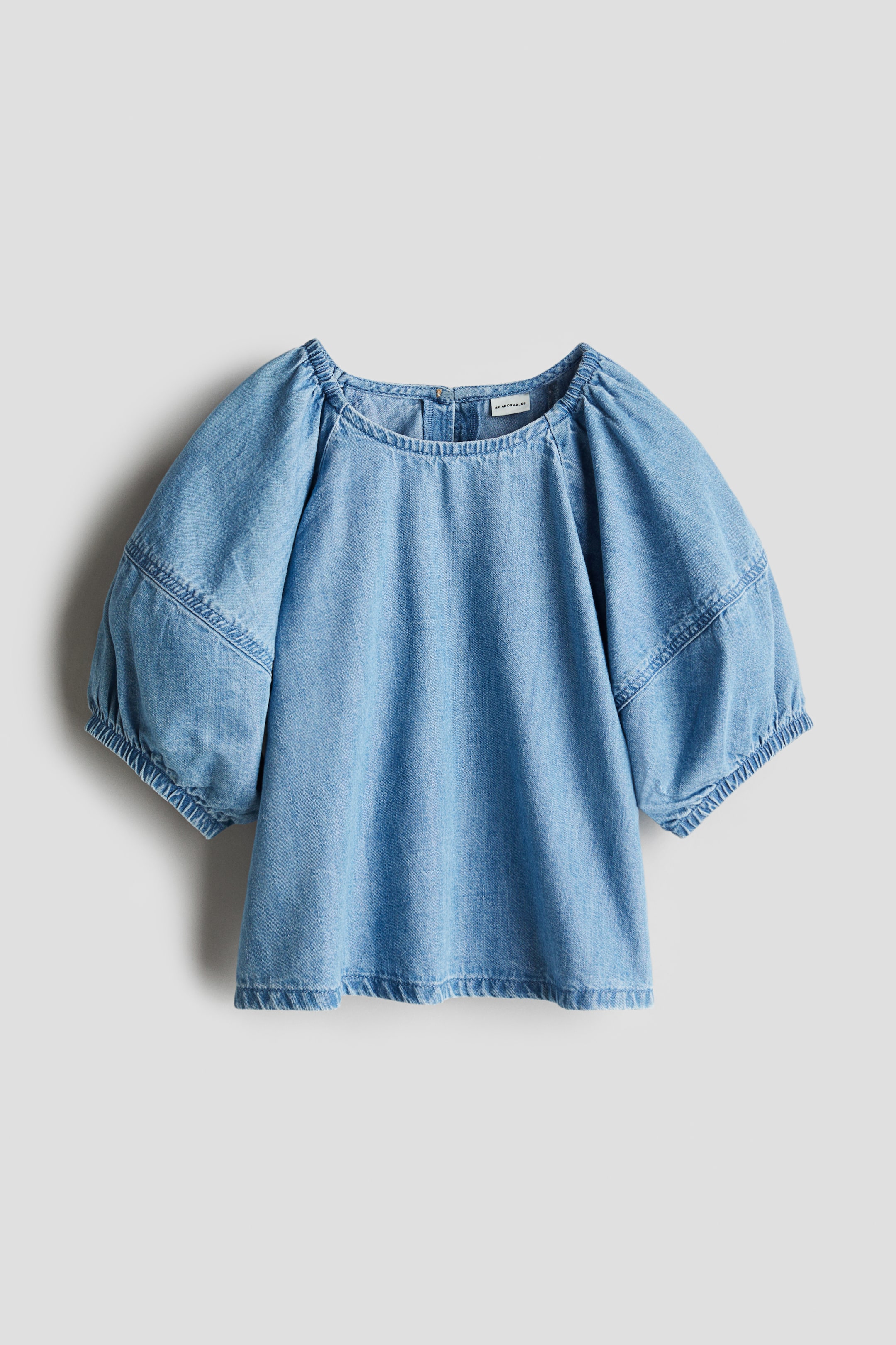 Flared denim blouse