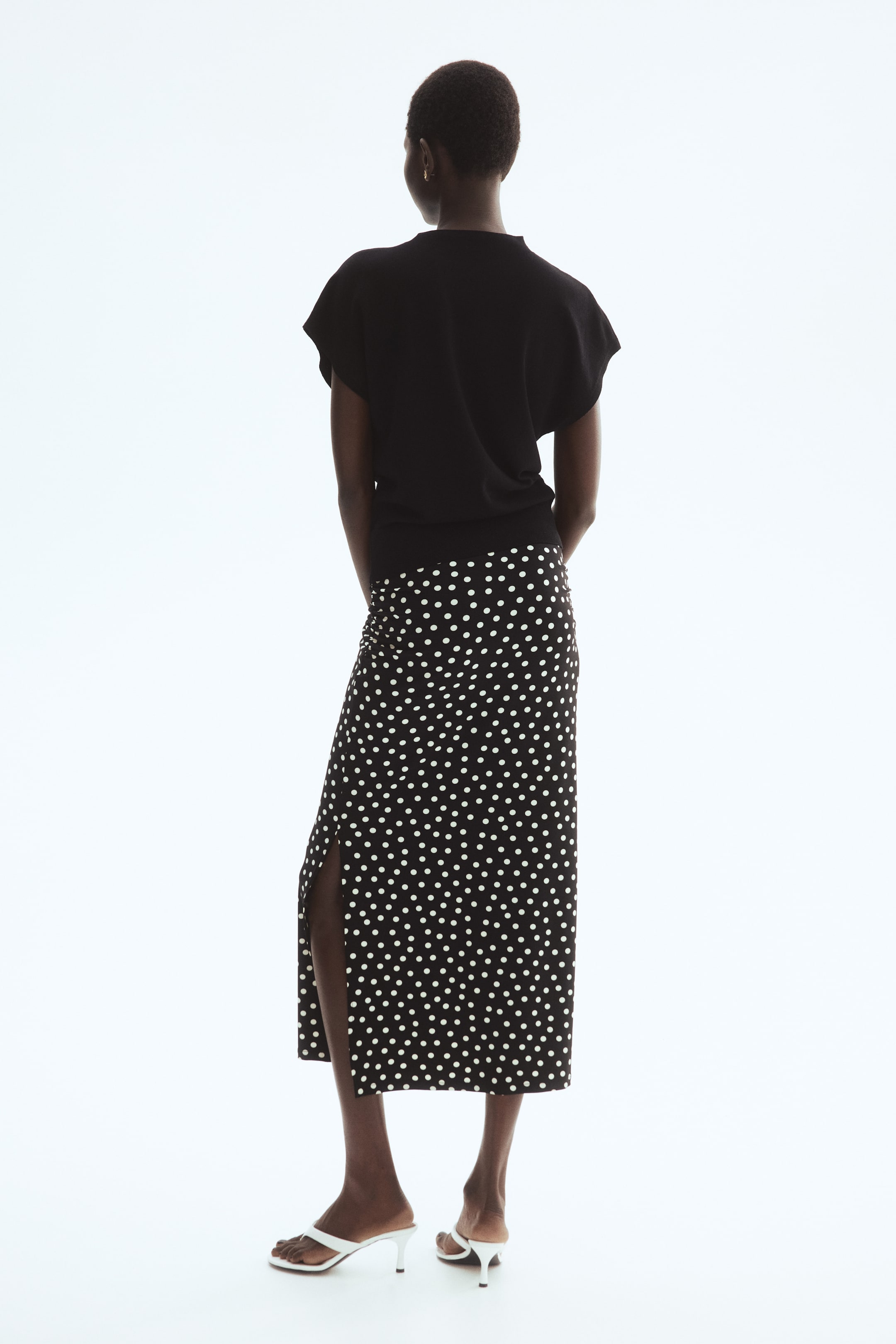 Jupe midi à effet drapé