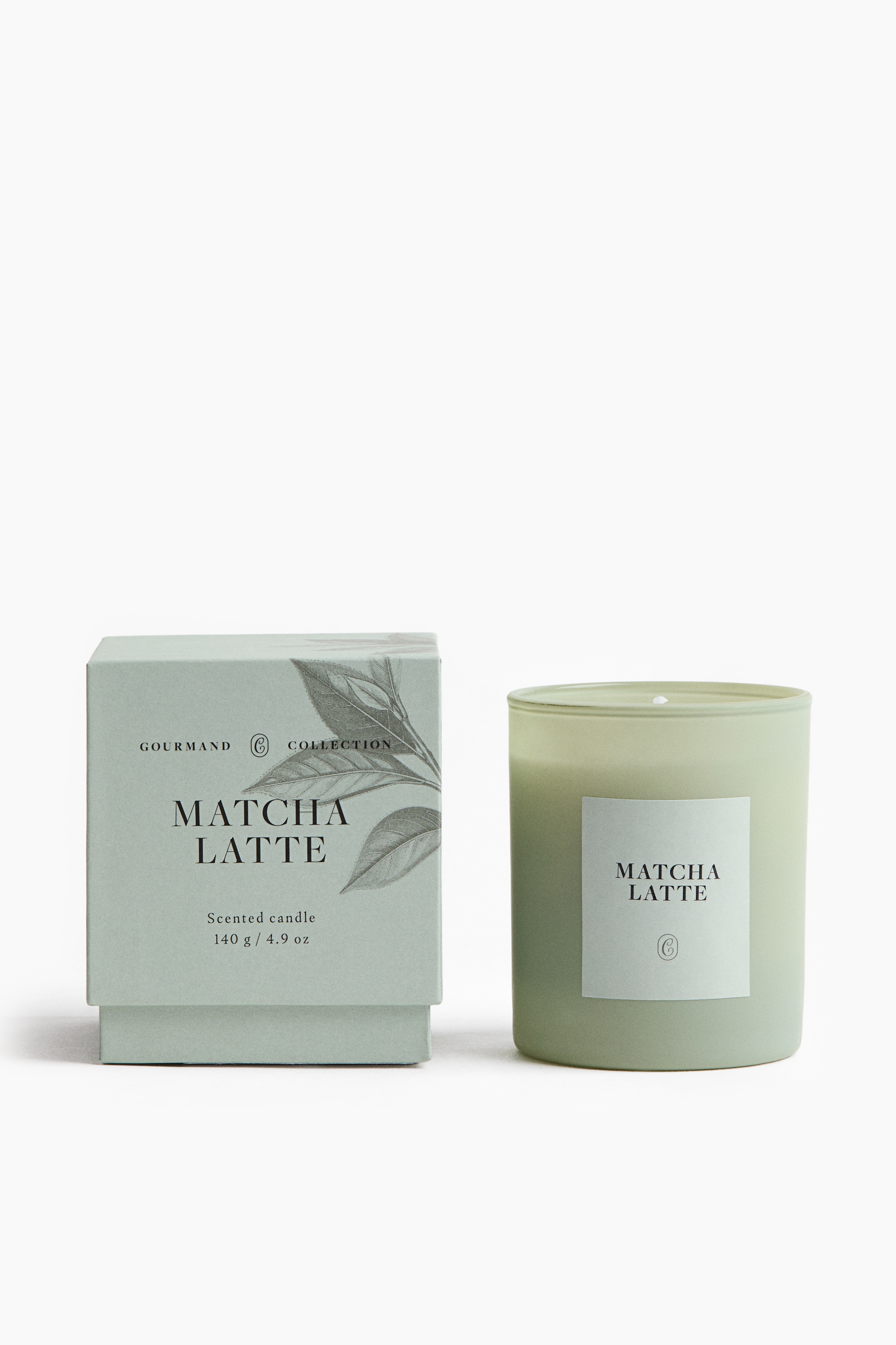 Vela aromática en recipiente de vidrioAuxiliar