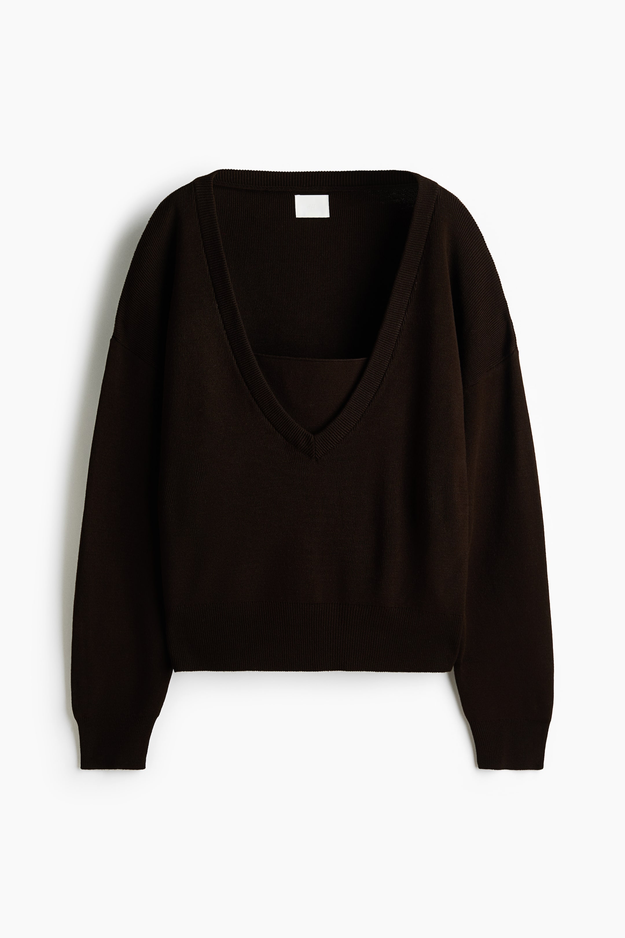 View larger image: A dark brown sweater is shown from the front, featuring a deep V-neckline with an internal panel that creates a square neckline beneath. It has long sleeves, ribbed cuffs, and a ribbed hem.