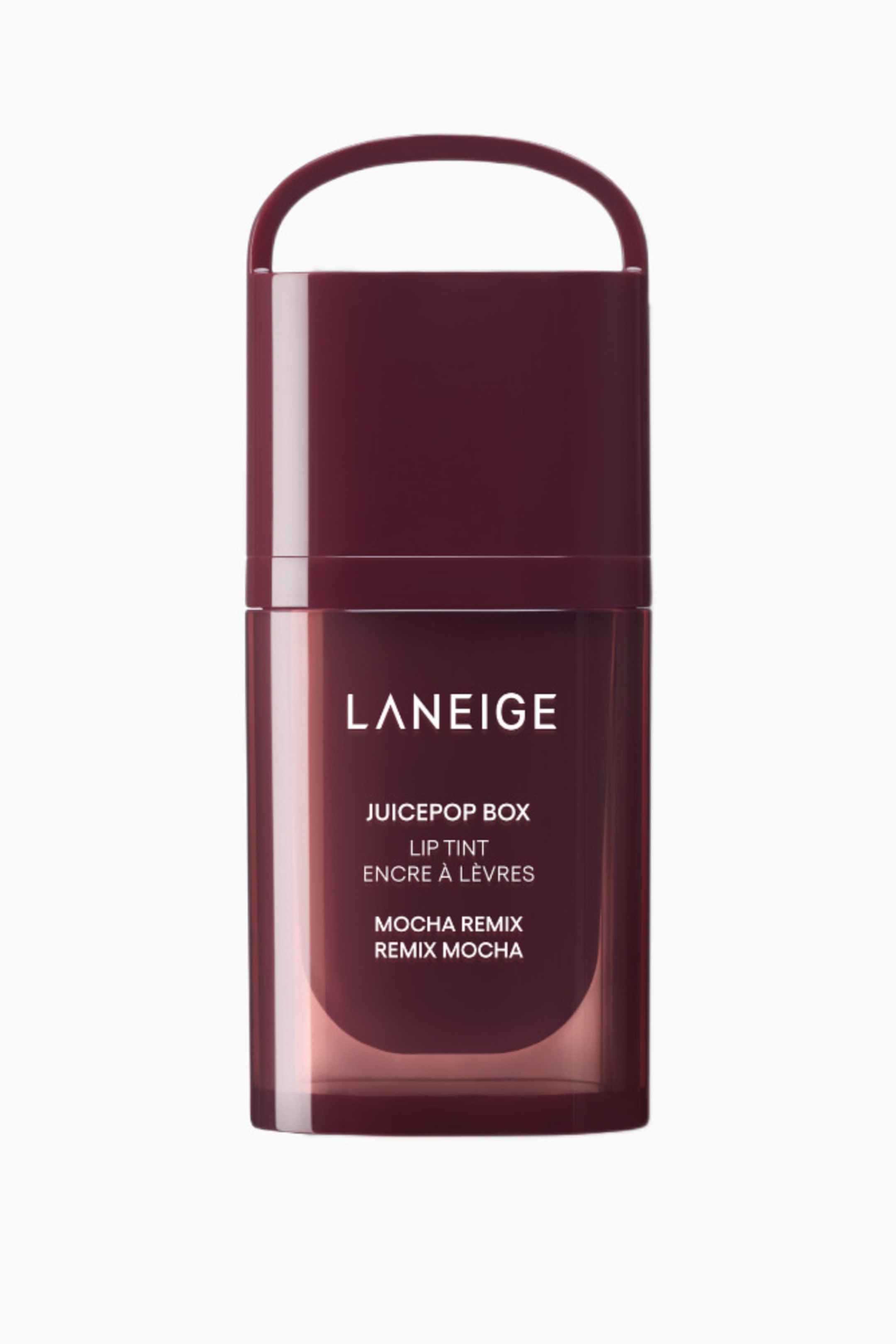 Visa större bild: En Laniege Juicepop Box Lip Tint i en mörk rödbrun nyans står upprätt, vänd framåt, med en genomskinlig nedre del som avslöjar produkten och ett ogenomskinligt övre lock med ett integrerat böjt handtag. Vit text på framsidan visar varumärket och produktinformationen.