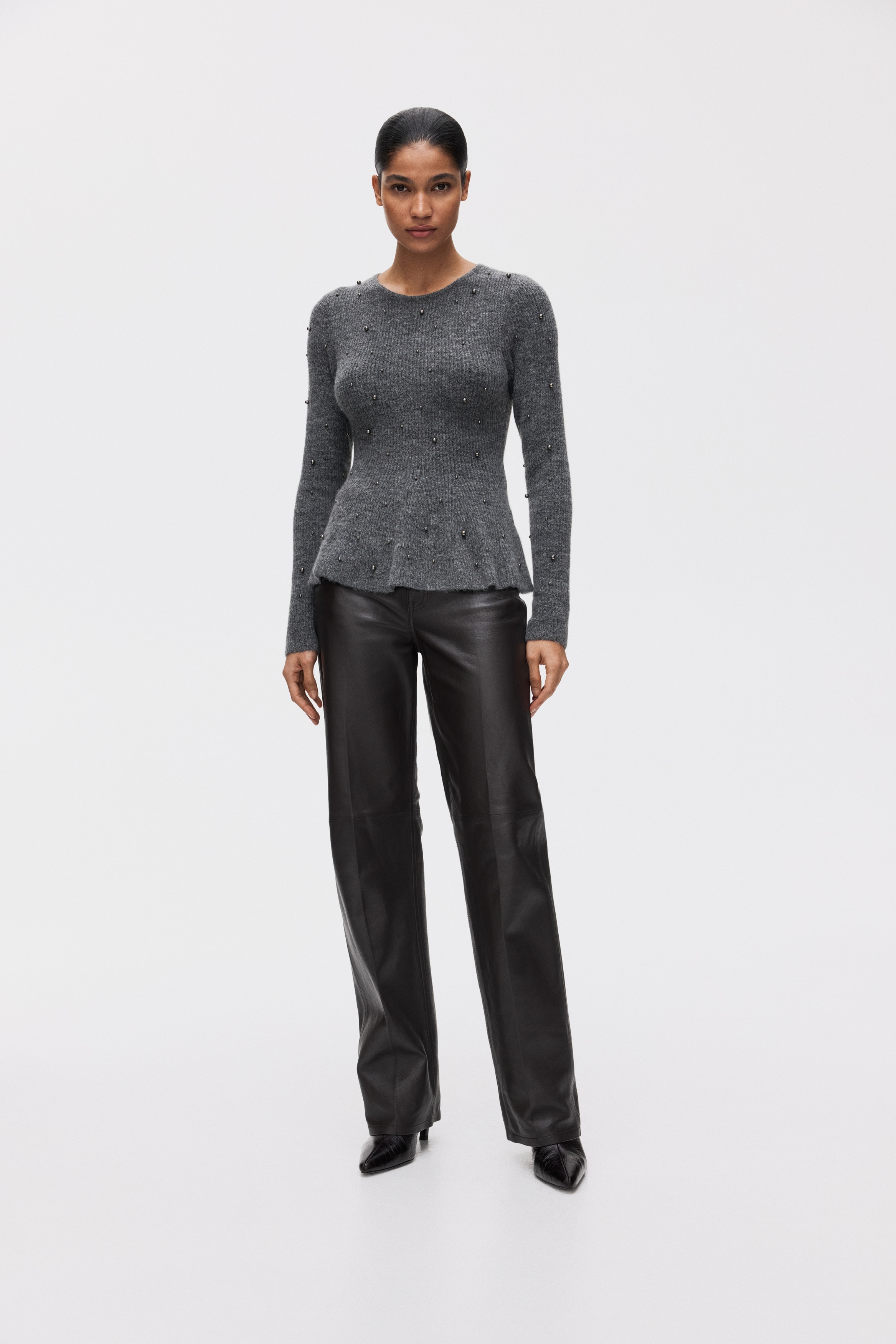 Bead-embellished peplum top