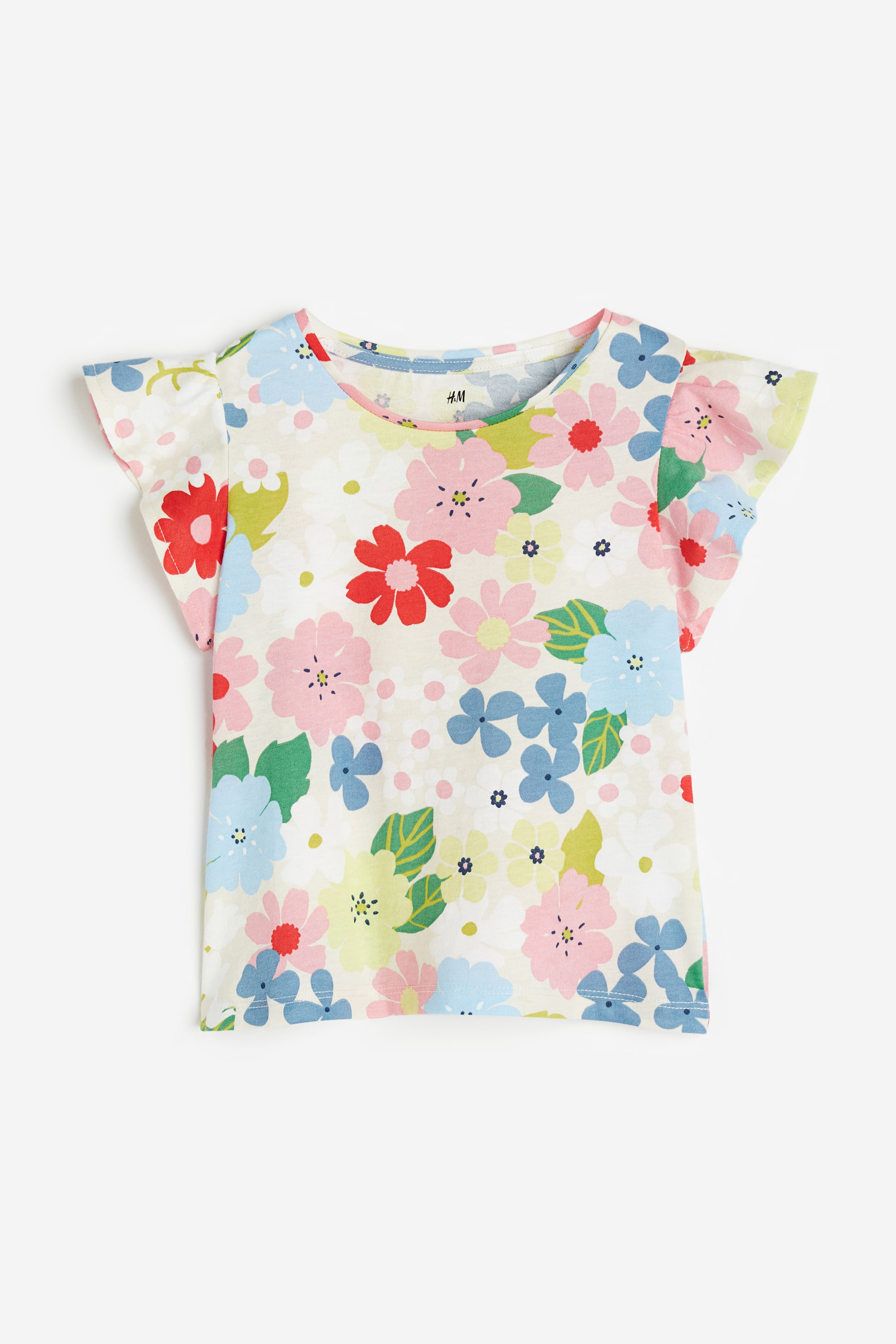 Se større billede: Top i jersey med flæseærmer - Naturhvid/Blomstret - BØRN | H&M DK 1