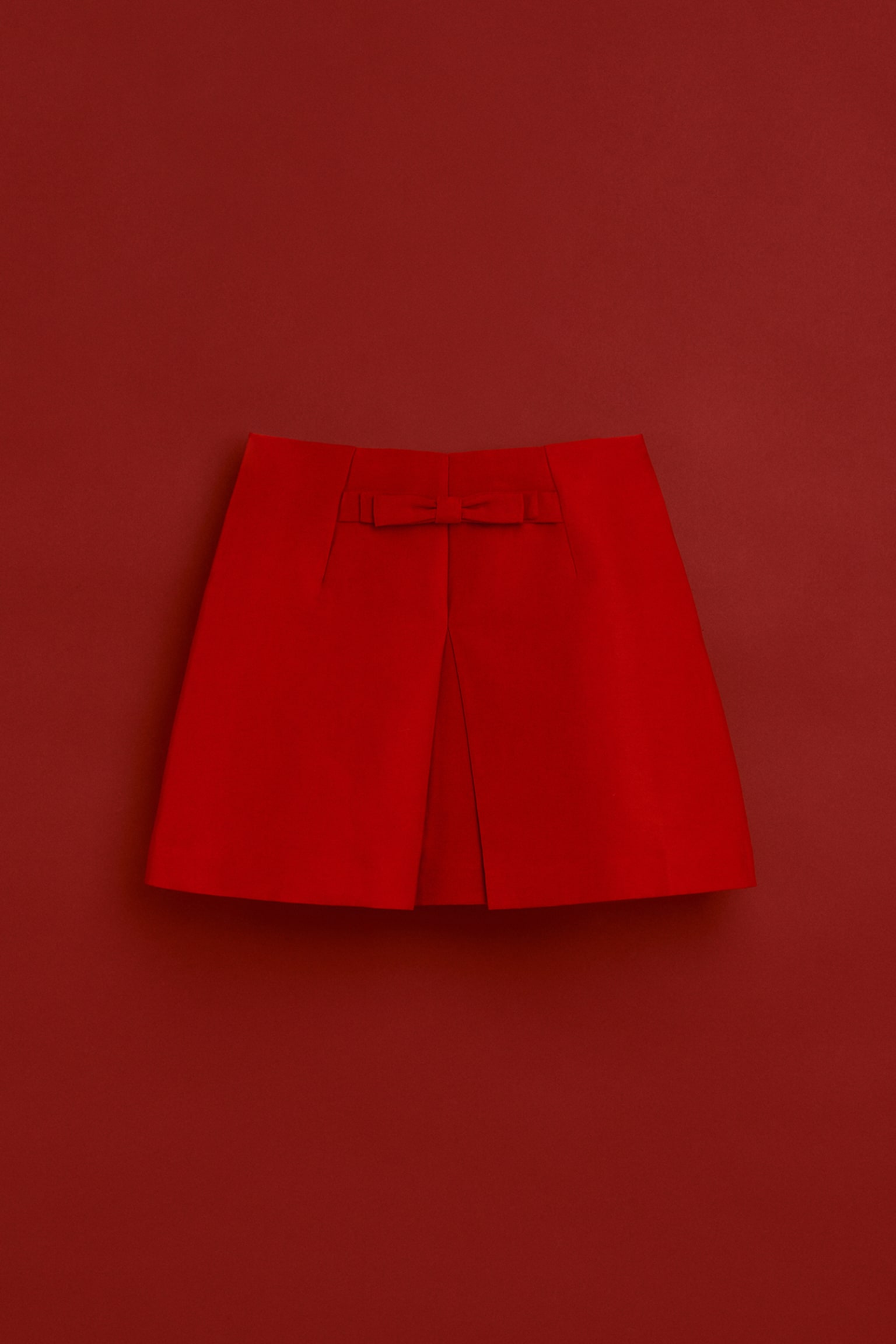 Minijupe avec nœud devant - Rouge vif/Marron foncé